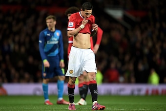 MANCHESTER, ENGLAND - MARCH 09:  A dejected Angel di Maria of Manchester United walks off the pitch after receiving the red card from referee Michael Oliver during the FA Cup Quarter Final match between Manchester United and Arsenal at Old Trafford on Mar