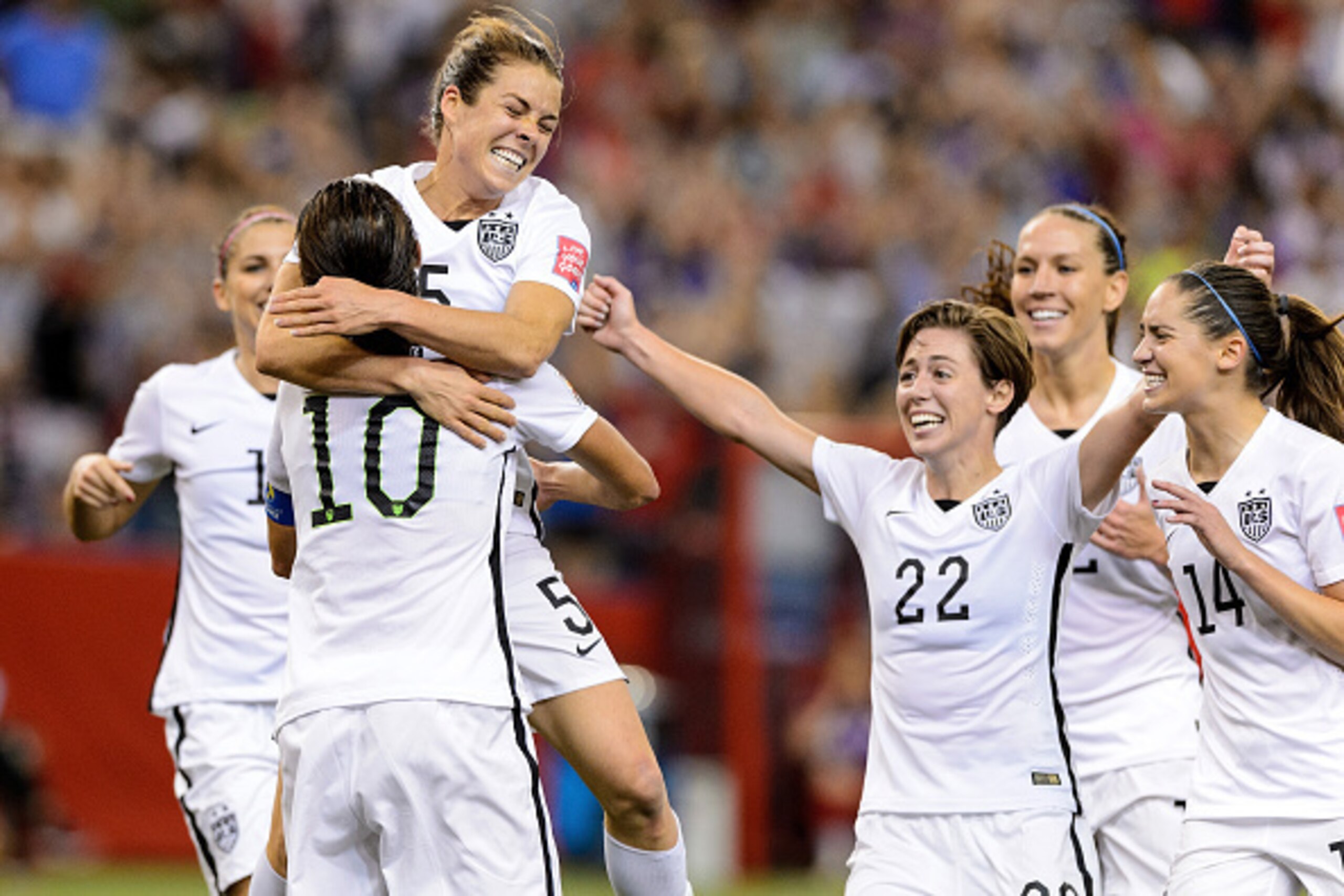 MONTREAL, QC - JUNE 30:  Kelley O'Hara #5 of the United States celebrates with teammates after scoring a goal in the second half against Germany in the FIFA Women's World Cup 2015 Semi-Final Match at Olympic Stadium on June 30, 2015 in Montreal, Canada.  