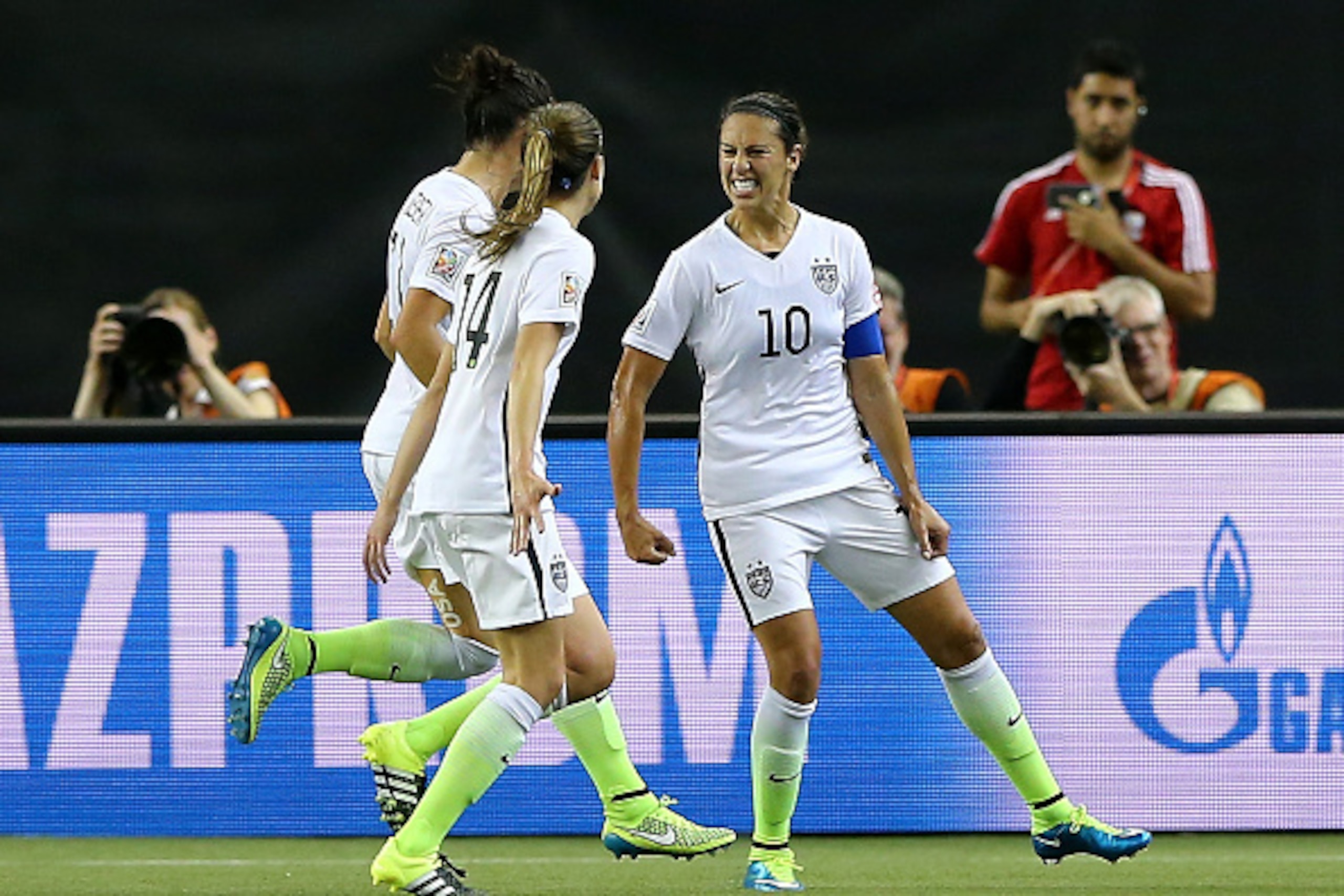 MONTREAL, QC - JUNE 30:  (R) Carli Lloyd #10 of the United States celebrates after scoring on a penalty kick for the opening goal against Germany in the FIFA Women's World Cup 2015 Semi-Final Match at Olympic Stadium on June 30, 2015 in Montreal, Canada. 