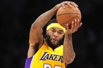 February 20, 2015; Los Angeles, CA, USA; Los Angeles Lakers center Jordan Hill (27) grabs a rebound against the Brooklyn Nets during the first half at Staples Center. Mandatory Credit: Gary A. Vasquez-USA TODAY Sports