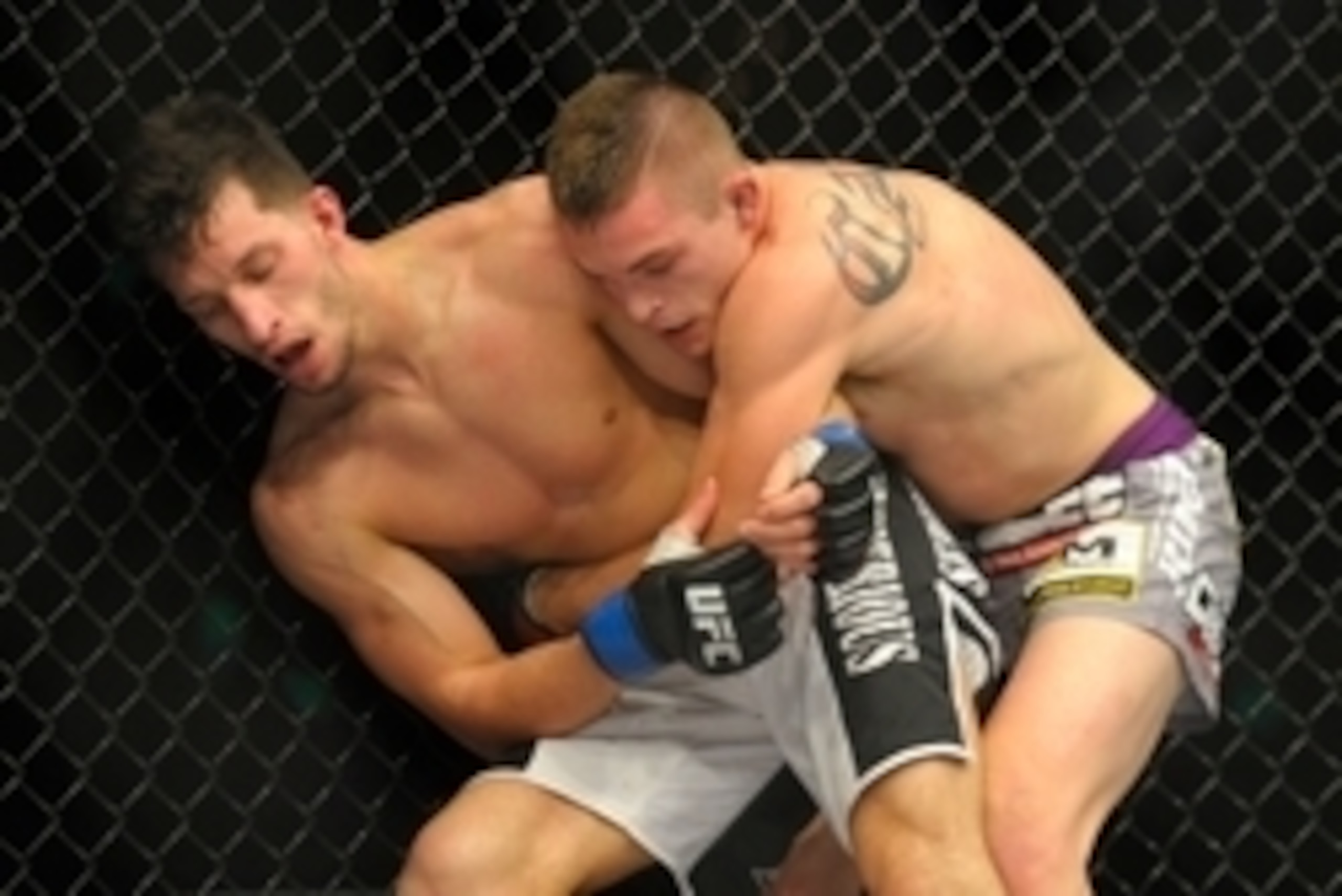 Jan 18, 2015; Boston, MA, USA; Frankie Perez (left) fights against Johhny Case during UFC Fight Night at TD Garden. Mandatory Credit: Bob DeChiara-USA TODAY Sports