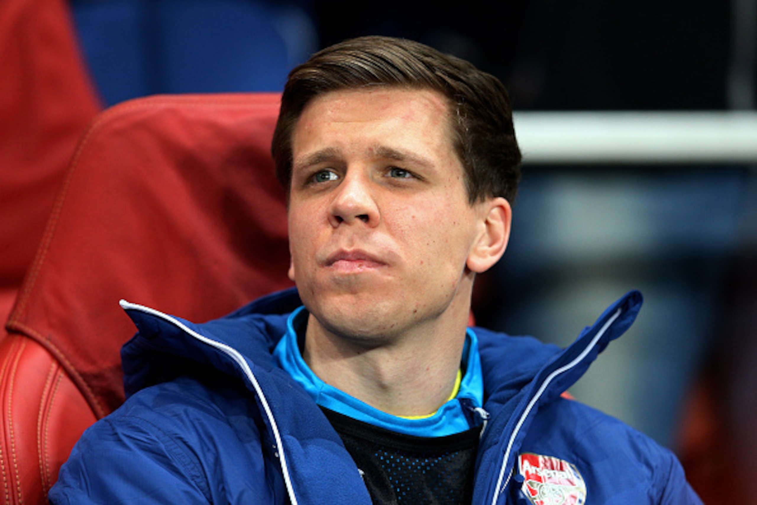 LONDON, ENGLAND - FEBRUARY 25: Goalkeeper Wojciech Szczesny of Arsenal looks on from the substitutes bench during the UEFA Champions League round of 16, first leg match between Arsenal and Monaco at The Emirates Stadium on February 25, 2015 in London, U LONDON, ENGLAND - FEBRUARY 25: Goalkeeper Wojciech Szczesny of Arsenal looks on from the substitutes bench during the UEFA Champions League round of 16, first leg match between Arsenal and Monaco at The Emirates Stadium on February 25, 2015 in London, U
