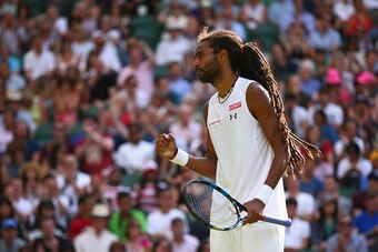 LONDON, ENGLAND - JULY 02:  Dustin Brown of Germany celebrates in his Gentlemens Singles Second Round match against Rafael Nadal of Spain during day four of the Wimbledon Lawn Tennis Championships at the All England Lawn Tennis and Croquet Club on July 2,