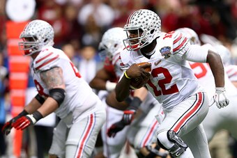 NEW ORLEANS, LA - JANUARY 01:  Cardale Jones #12 of the Ohio State Buckeyes in action against the Alabama Crimson Tide during the All State Sugar Bowl at the Mercedes-Benz Superdome on January 1, 2015 in New Orleans, Louisiana.  (Photo by Streeter Lecka/G