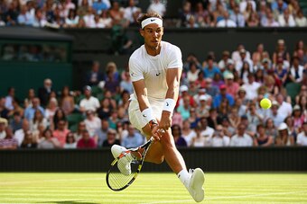 LONDON, ENGLAND - JULY 02:  Rafael Nadal of Spain plays a volley in his Gentlemens Singles Second Round match against  Dustin Brown of Germany during day four of the Wimbledon Lawn Tennis Championships at the All England Lawn Tennis and Croquet Club on Ju