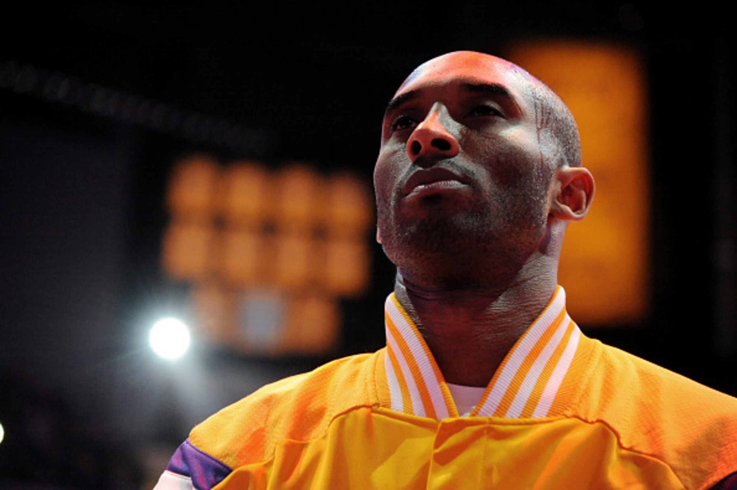 LOS ANGELES, CA - JANUARY 13: Kobe Bryant #24 of the Los Angeles Lakers stands for the national anthem before a game against the Miami Heat on January 13, 2015 in Los Angeles, California. NOTE TO USER: User expressly acknowledges and agrees that, by downl
