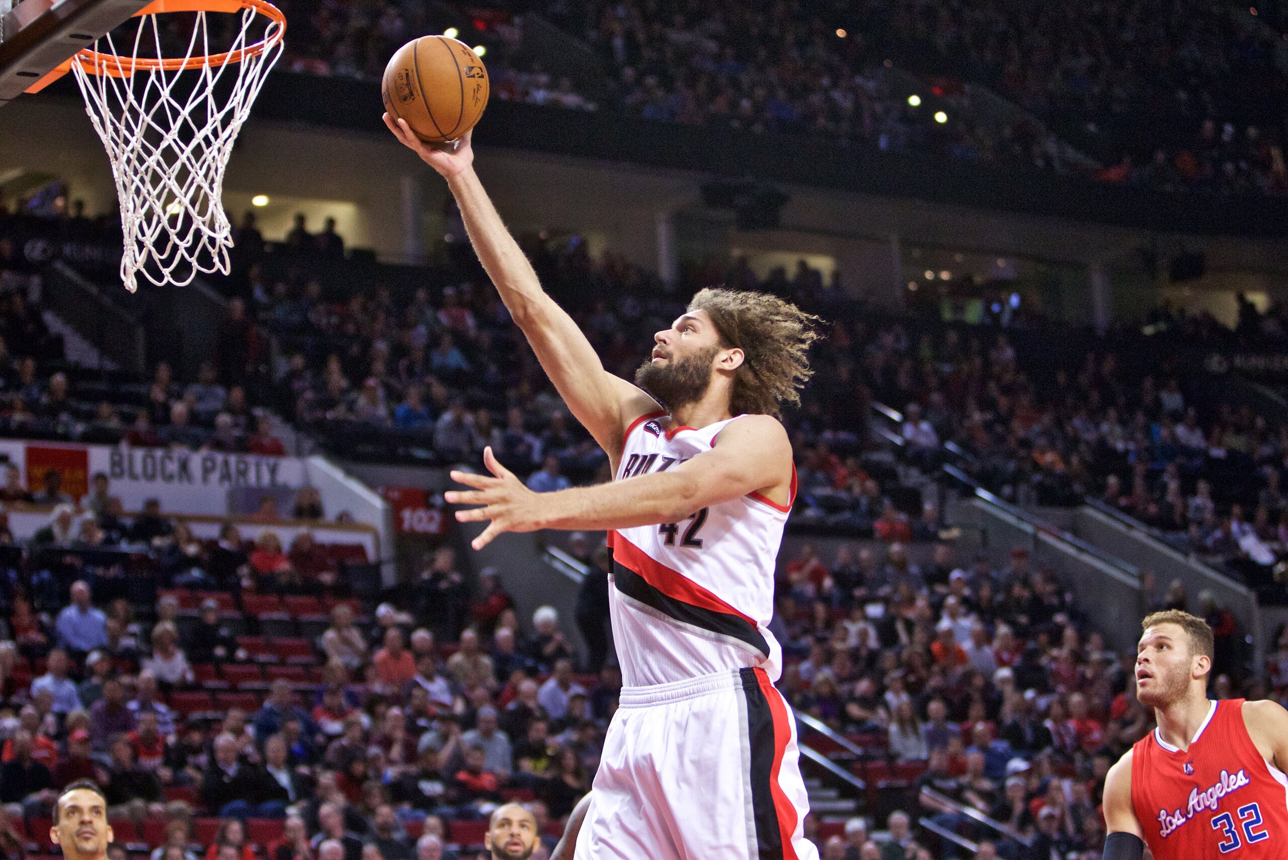 Apr 1, 2015; Portland, OR, USA; Portland Trail Blazers center Robin Lopez (42) shoots over Los Angeles Clippers forward Blake Griffin (32) during the first quarter at the Moda Center. Mandatory Credit: Craig Mitchelldyer-USA TODAY Sports