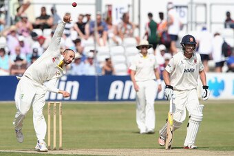 CHELMSFORD, ENGLAND - JULY 02:  Nathan Lyon of Australia bowls during day two of the tour match between Essex and Australia at The Ford County Ground on July 2, 2015 in Chelmsford, England.  (Photo by David Rogers/Getty Images)