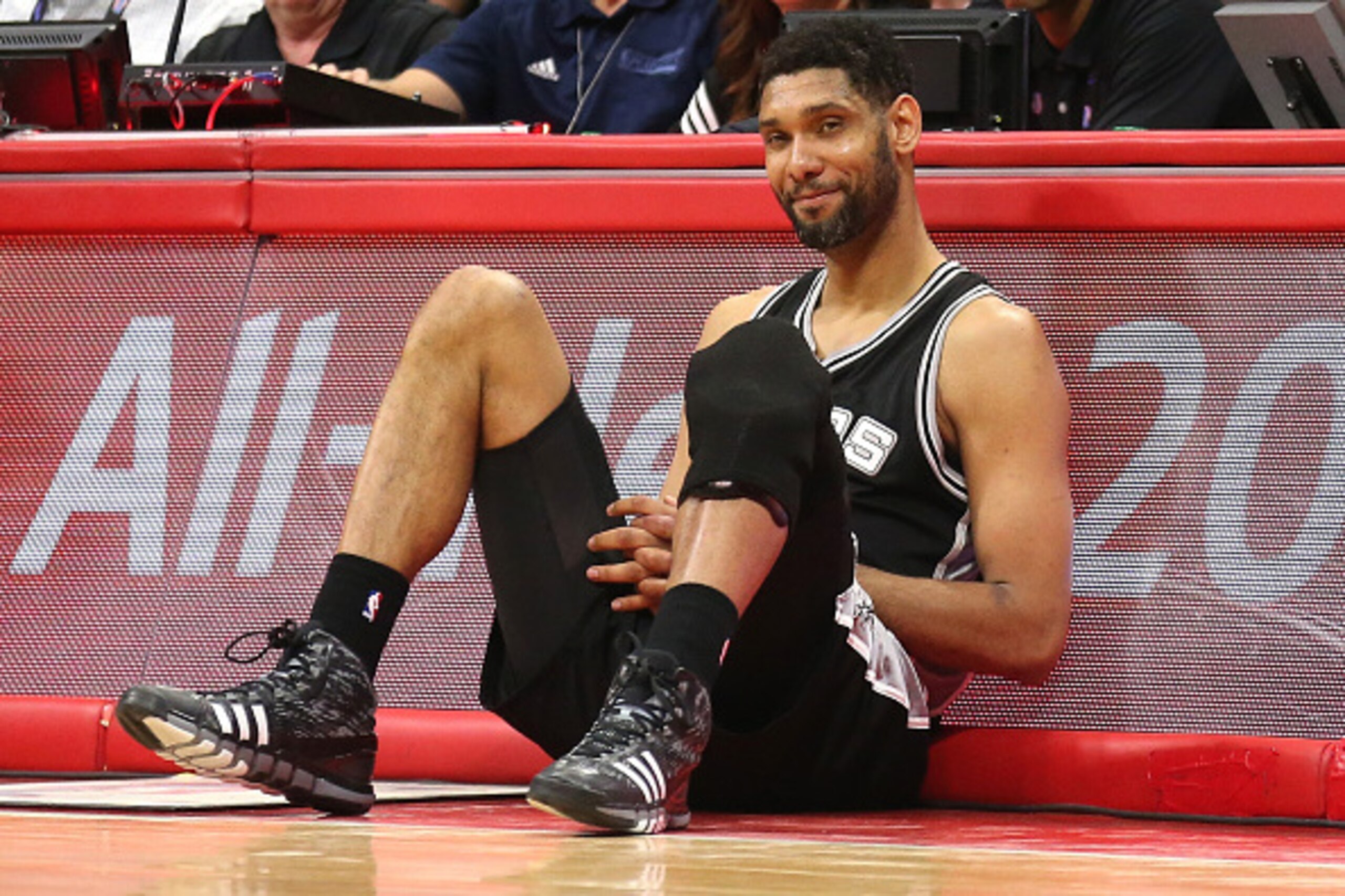 LOS ANGELES, CA - MAY 02: Tim Duncan #21 of the San Antonio Spurs as he sits by the scorer's table waiting to enter the game against the Los Angeles Clippers during Game Seven of the Western Conference quarterfinals of the 2015 NBA Playoffs at Staples Cen