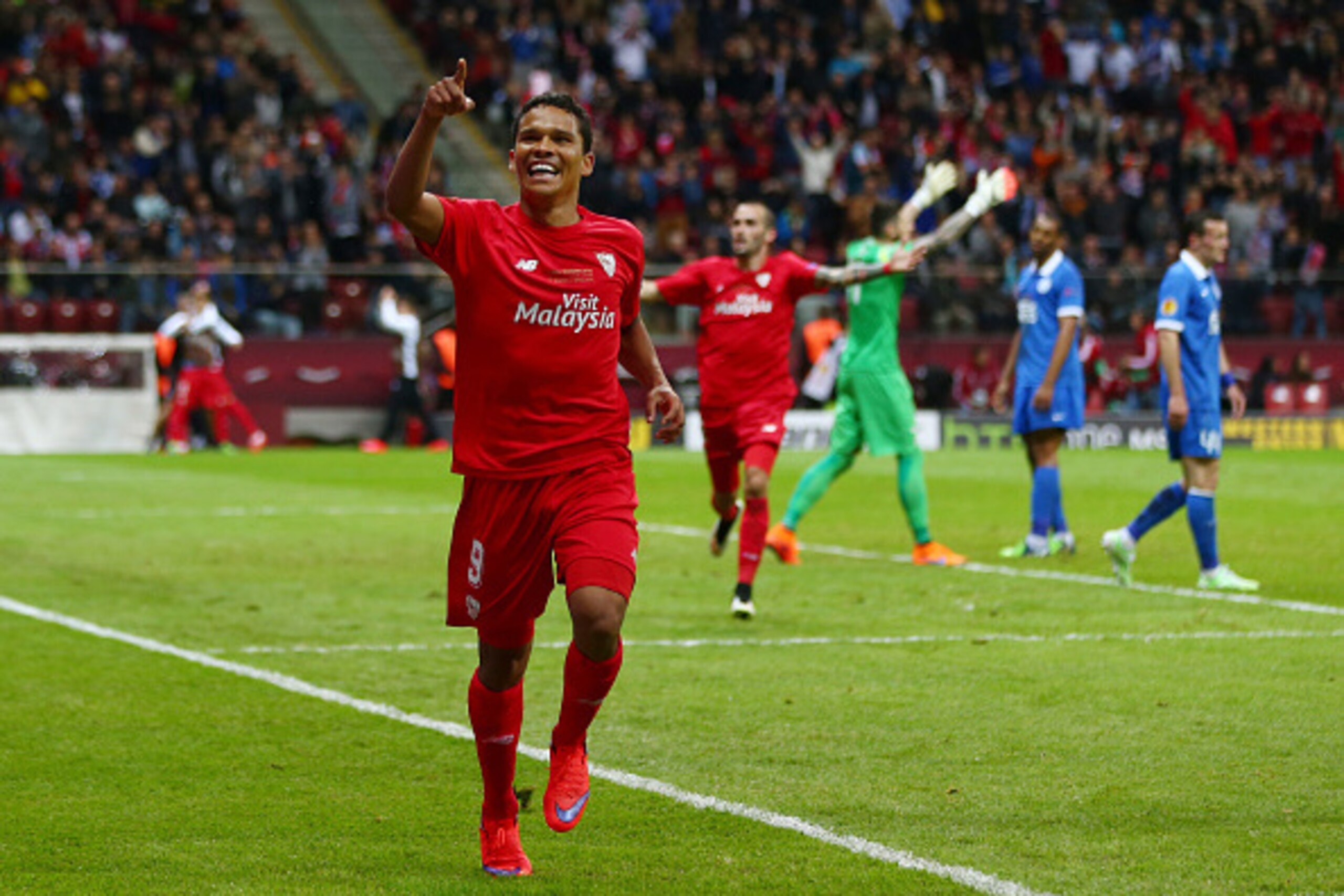 WARSAW, POLAND - MAY 27: Carlos Bacca of Sevilla celebrates scoring his team's third goal during the UEFA Europa League Final match between FC Dnipro Dnipropetrovsk and FC Sevilla on May 27, 2015 in Warsaw, Poland. (Photo by Michael Steele/Getty Images) WARSAW, POLAND - MAY 27: Carlos Bacca of Sevilla celebrates scoring his team's third goal during the UEFA Europa League Final match between FC Dnipro Dnipropetrovsk and FC Sevilla on May 27, 2015 in Warsaw, Poland. (Photo by Michael Steele/Getty Images)