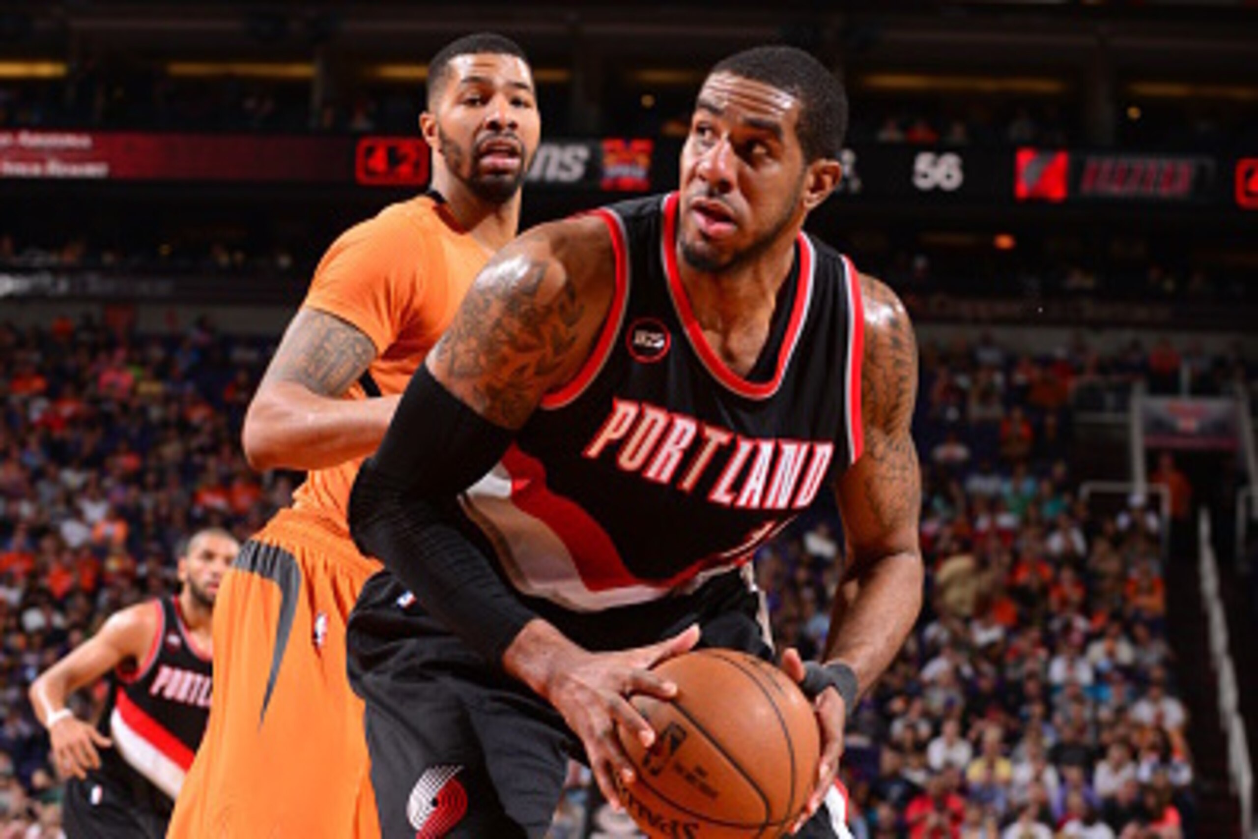 PHOENIX, AZ - MARCH 27: LaMarcus Aldridge #12 of the Portland Trail Blazers handles the ball against the Phoenix Suns on March 27, 2015 at U.S. Airways Center in Phoenix, Arizona. NOTE TO USER: User expressly acknowledges and agrees that, by downloading a