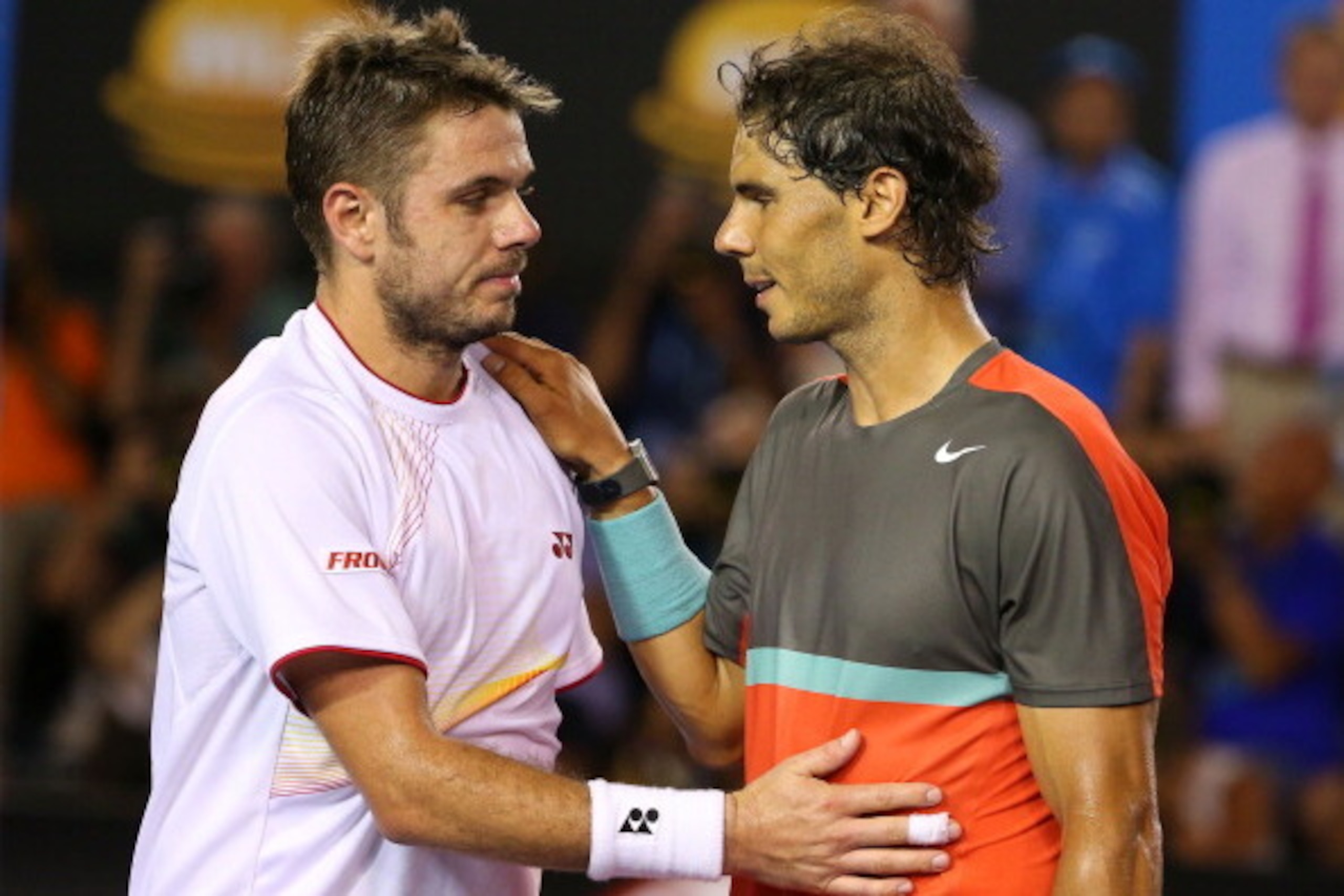 MELBOURNE, AUSTRALIA - JANUARY 26:  Stanislas Wawrinka of Switzerland and Rafael Nadal of Spain hug at the net after Wawrinka won their men's final match during day 14 of the 2014 Australian Open at Melbourne Park on January 26, 2014 in Melbourne, Austral