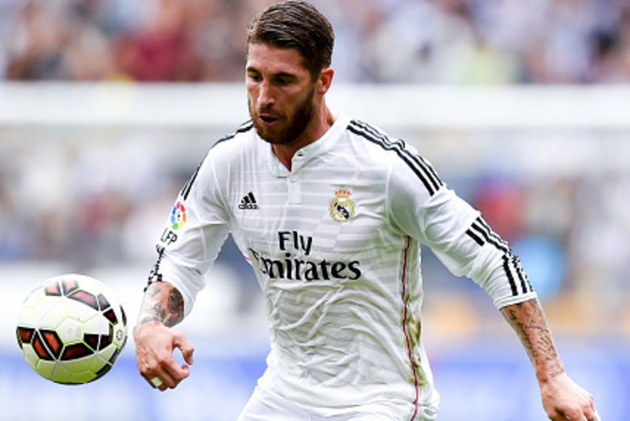 LA CORUNA, SPAIN - SEPTEMBER 20:  Sergio Ramos of Real Madrid CF runs with the ball during the La Liga match between RC Deportivo La Coruna and Real Madrid CF at Riazor Stadium on September 20, 2014 in La Coruna, Spain.  (Photo by David Ramos/Getty Images