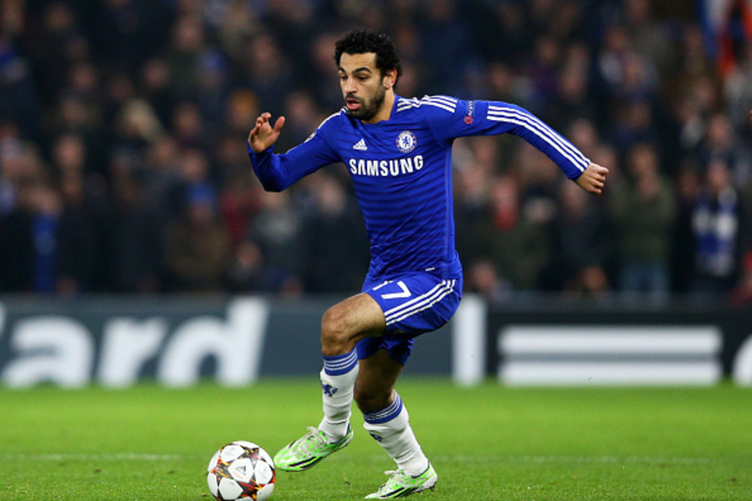 LONDON, ENGLAND - DECEMBER 10: Mohamed Salah of Chelsea runs with the ball during the UEFA Champions League group G match between Chelsea and Sporting Clube de Portugal at Stamford Bridge on December 10, 2014 in London, United Kingdom. (Photo by Clive M LONDON, ENGLAND - DECEMBER 10: Mohamed Salah of Chelsea runs with the ball during the UEFA Champions League group G match between Chelsea and Sporting Clube de Portugal at Stamford Bridge on December 10, 2014 in London, United Kingdom. (Photo by Clive M