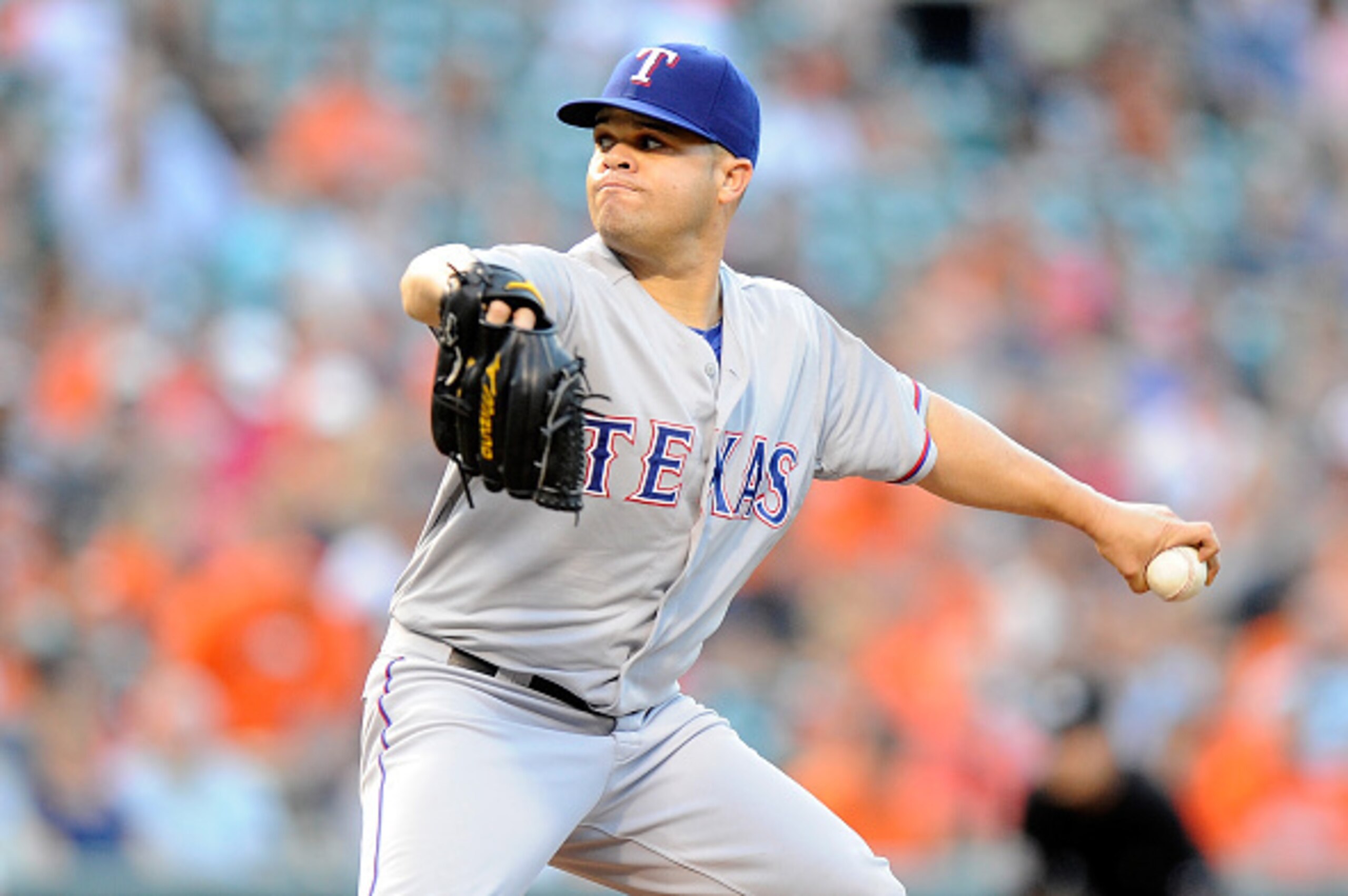 BALTIMORE, MD - JUNE 29:  Wandy Rodriguez #51 of the Texas Rangers pitches in the second inning against the Baltimore Orioles at Oriole Park at Camden Yards on June 29, 2015 in Baltimore, Maryland.  (Photo by Greg Fiume/Getty Images)