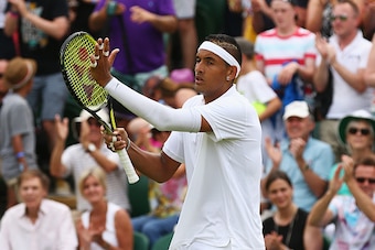 LONDON, ENGLAND - JULY 03:  Nick Kyrgios of Australia celebrates victory in his GentlemenÂs Singles Third Round match against Milos Raonic of Canada during day five of the Wimbledon Lawn Tennis Championships at the All England Lawn Tennis and Croquet Club