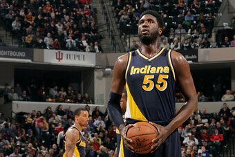 INDIANAPOLIS - FEBRUARY 27: Roy Hibbert #55 of the Indiana Pacers attempts a free throw against the Cleveland Cavaliers at Bankers Life Fieldhouse on February 27, 2015 in Indianapolis, Indiana.  NOTE TO USER: User expressly acknowledges and agrees that, b