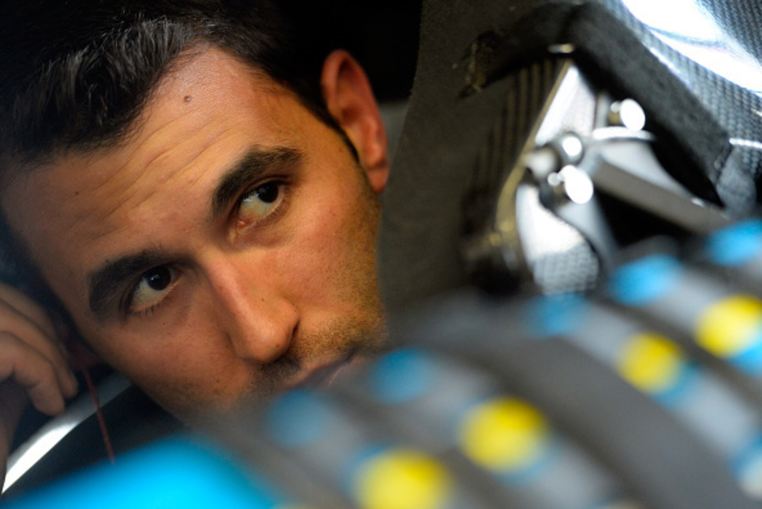 DAYTONA BEACH, FL - JULY 03:  Aric Almirola, driver of the #98 Fresh from Florida Ford, sits in his car in the garage during practice for the NASCAR XFINITY Series Subway Firecracker 250 at Daytona International Speedway on July 3, 2015 in Daytona Beach, 