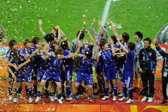 FRANKFURT AM MAIN, GERMANY - JULY 17:  The team of Japan celebrates after winning the FIFA Womens's World Cup Final between the United States of America and Japan at FIFA Word Cup stadium on July 17, 2011 in Frankfurt am Main, Germany.  (Photo by Thorsten