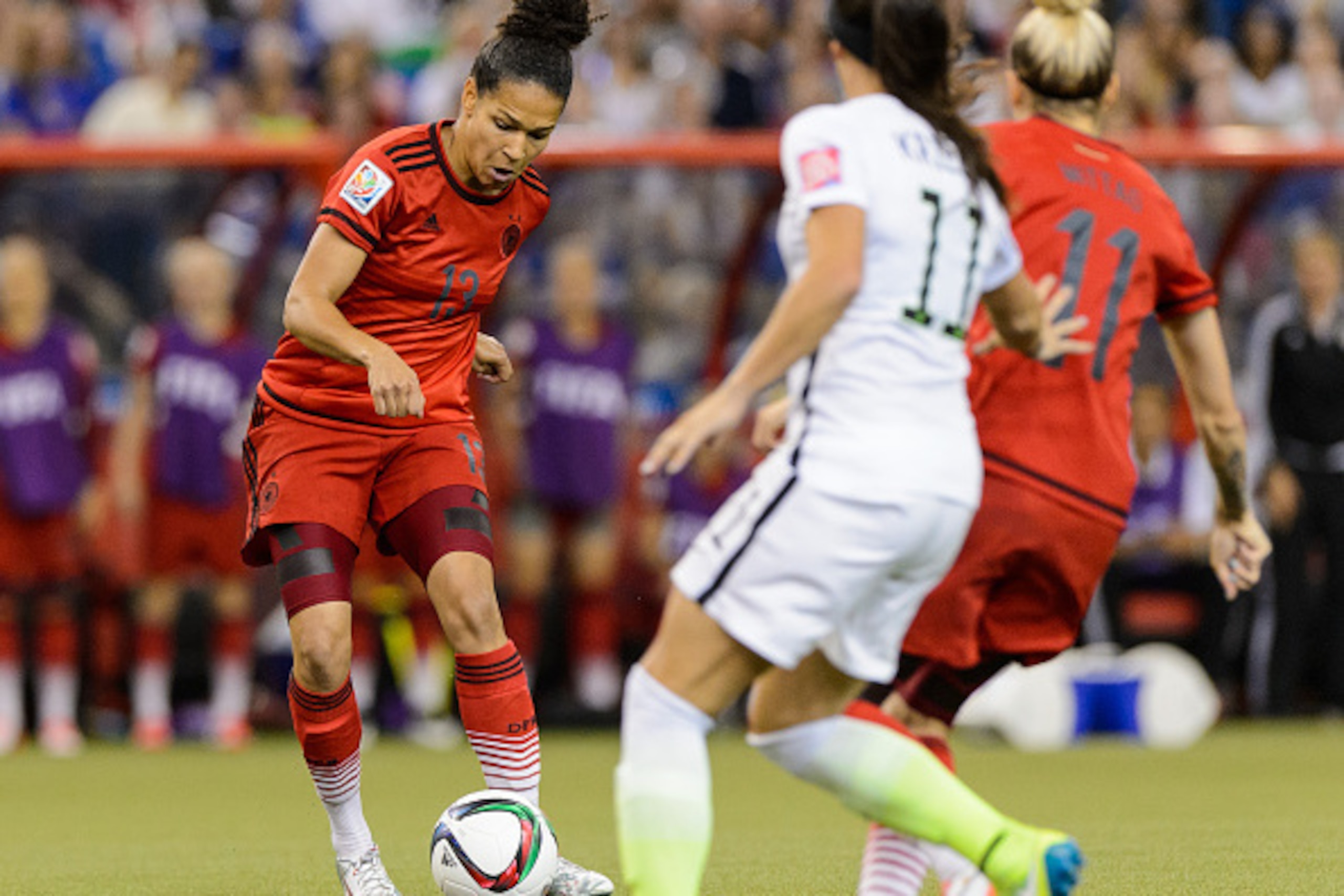 MONTREAL, QC - JUNE 30: Celia Sasic #13 of Germany controls the ball during the 2015 FIFA Women's World Cup semi final match against the USA at Olympic Stadium on June 30, 2015 in Montreal, Quebec, Canada. The United States defeated Germany 2-0 and move t