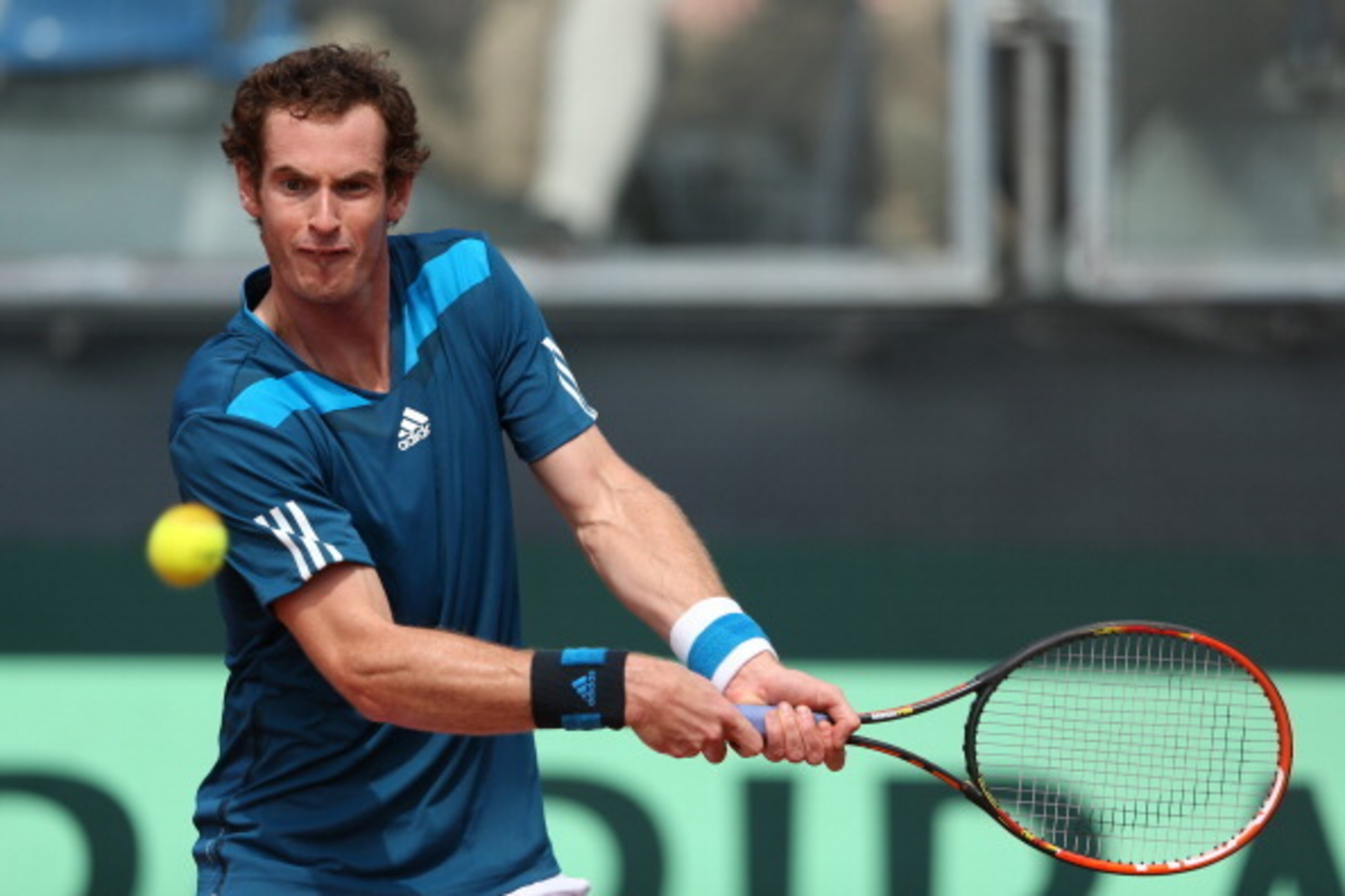 NAPLES, ITALY - APRIL 05:  Andy Murray of Great Britain plays a backhand against Andreas Seppi  of Italy during day two of the Davis Cup World Group Quarter Final match between Italy and Great Britain at Tennis Club Napoli  on April 5, 2014 in Naples, Ita