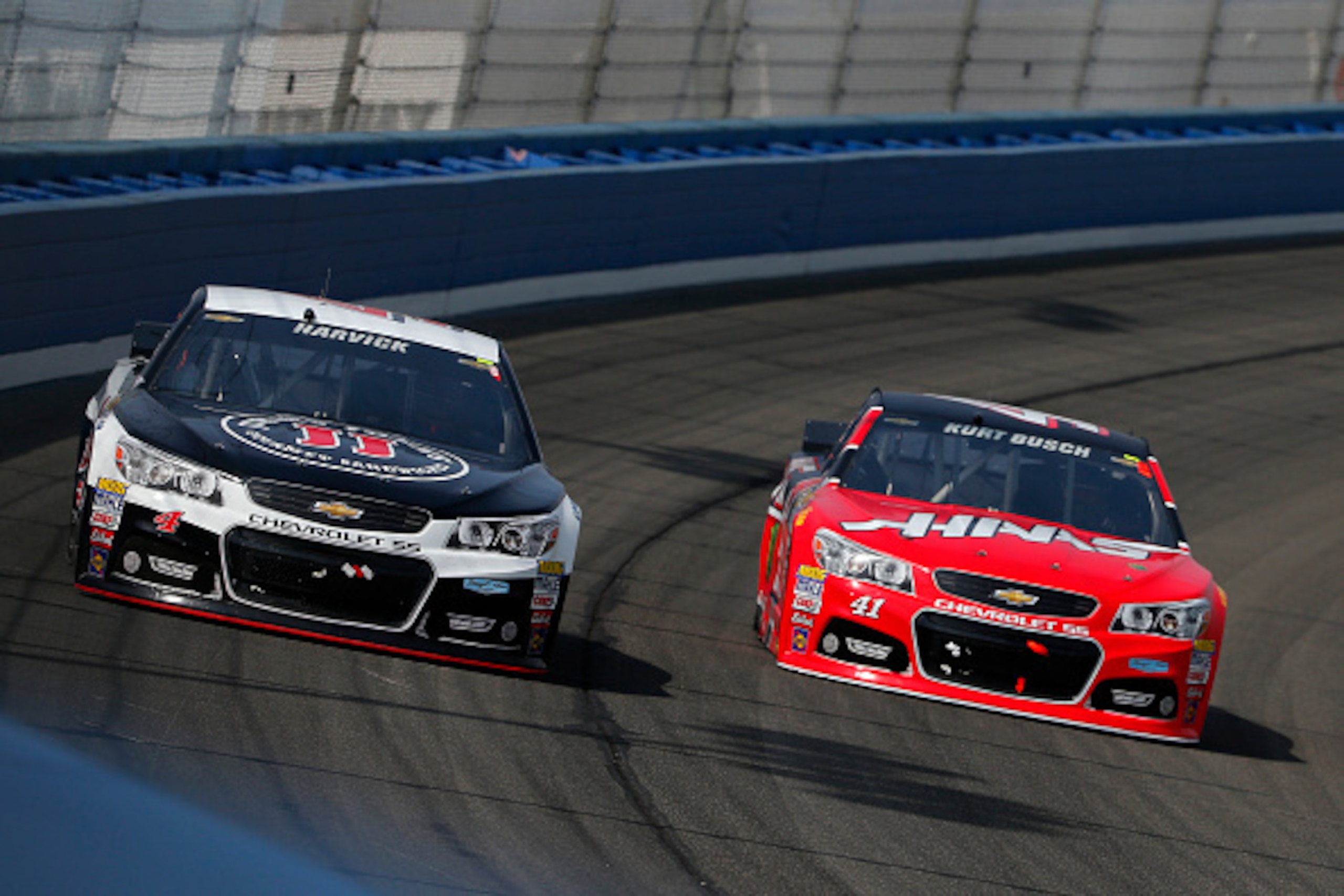 FONTANA, CA - MARCH 22: Kevin Harvick, driver of the #4 Jimmy John's/Budweiser Chevrolet, leads Kurt Busch, driver of the #41 Haas Automation Chevrolet, during the NASCAR Sprint Cup Series Auto Club 400 at Auto Club Speedway on March 22, 2015 in Fontana, FONTANA, CA - MARCH 22: Kevin Harvick, driver of the #4 Jimmy John's/Budweiser Chevrolet, leads Kurt Busch, driver of the #41 Haas Automation Chevrolet, during the NASCAR Sprint Cup Series Auto Club 400 at Auto Club Speedway on March 22, 2015 in Fontana,