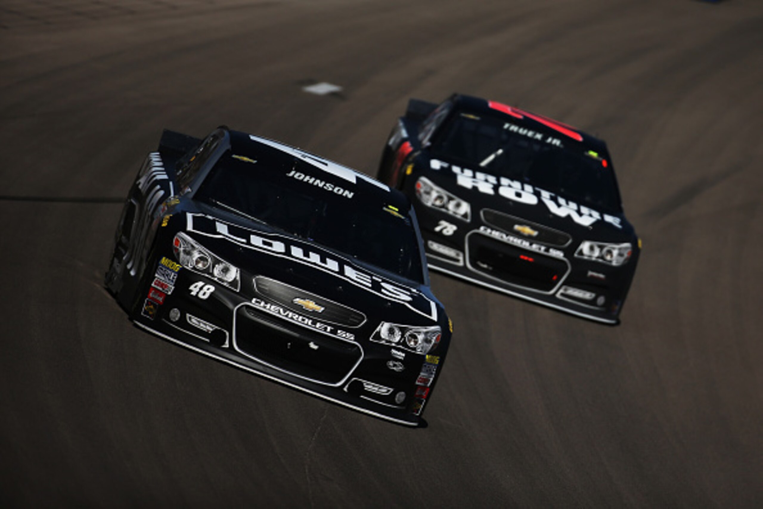 LAS VEGAS, NV - MARCH 08: Jimmie Johnson, driver of the #48 Kobalt Tools Chevrolet, leads Martin Truex Jr., driver of the #78 Furniture Row Chevrolet, during the NASCAR Sprint Cup Series Kobalt 400 at Las Vegas Motor Speedway on March 8, 2015 in Las Vega LAS VEGAS, NV - MARCH 08: Jimmie Johnson, driver of the #48 Kobalt Tools Chevrolet, leads Martin Truex Jr., driver of the #78 Furniture Row Chevrolet, during the NASCAR Sprint Cup Series Kobalt 400 at Las Vegas Motor Speedway on March 8, 2015 in Las Vega