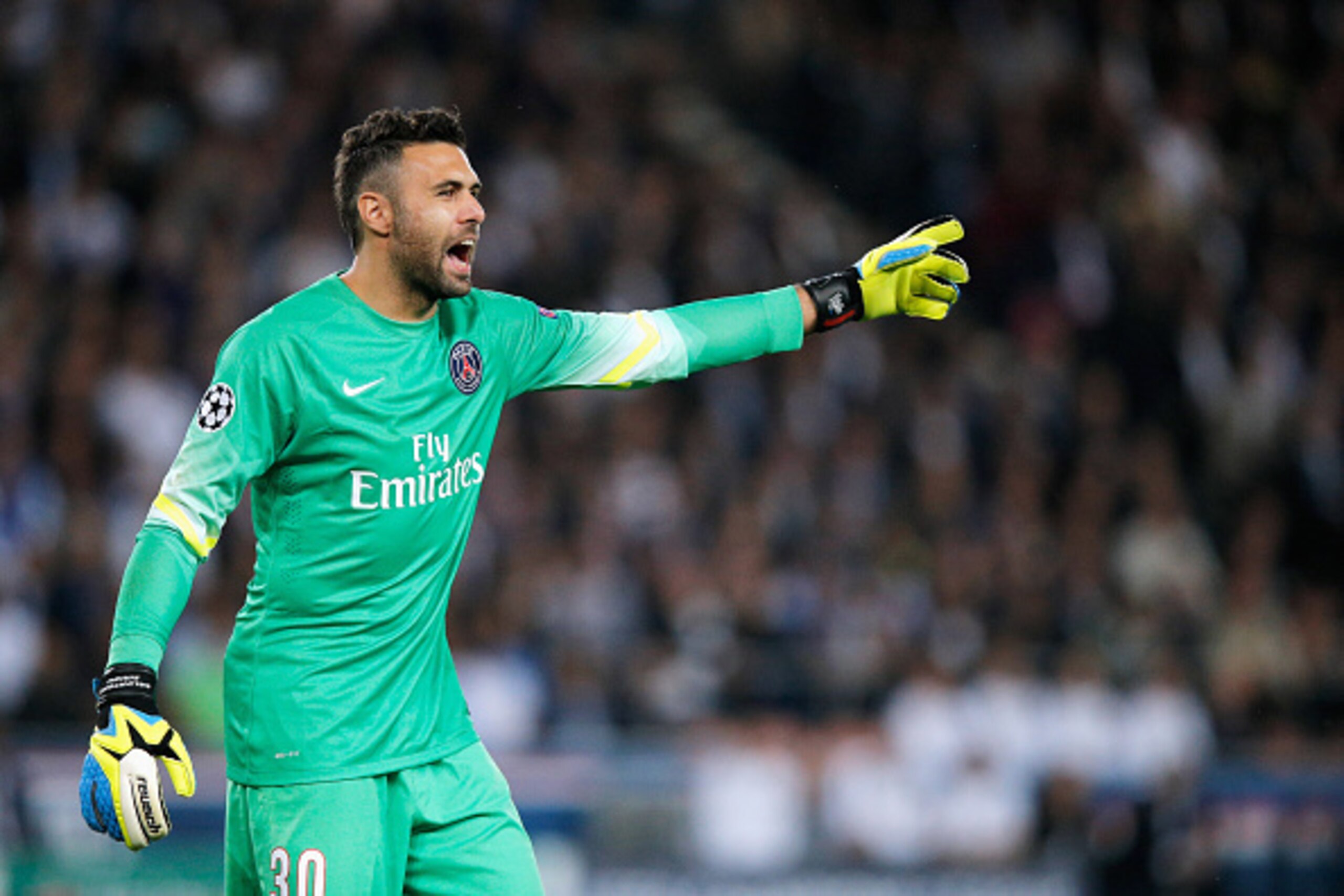 PARIS, FRANCE - SEPTEMBER 30:  Goalkeeper, Salvatore Sirigu of PSG gives his team mates instructions during the Group F UEFA Champions League match between Paris Saint-Germain v FC Barcelona held at Parc des Princes on September 30, 2014 in Paris, France.