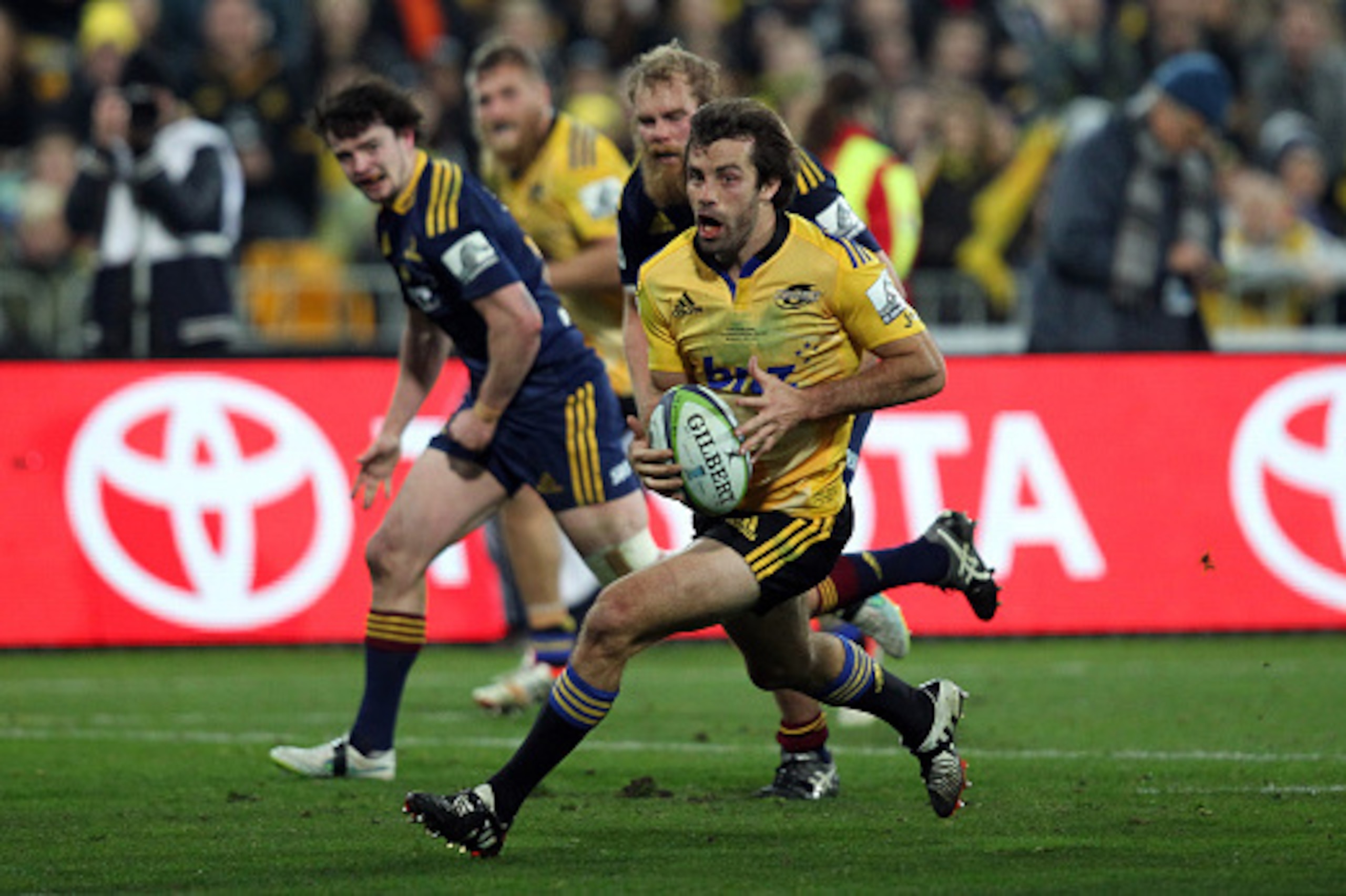WELLINGTON, NEW ZEALAND - JULY 04: Conrad Smith of the Hurricanes on the attack during the Super Rugby Final match between the Hurricanes and the Highlanders at Westpac Stadium on July 4, 2015 in Wellington, New Zealand.  (Photo by Rob Jefferies/Getty Ima