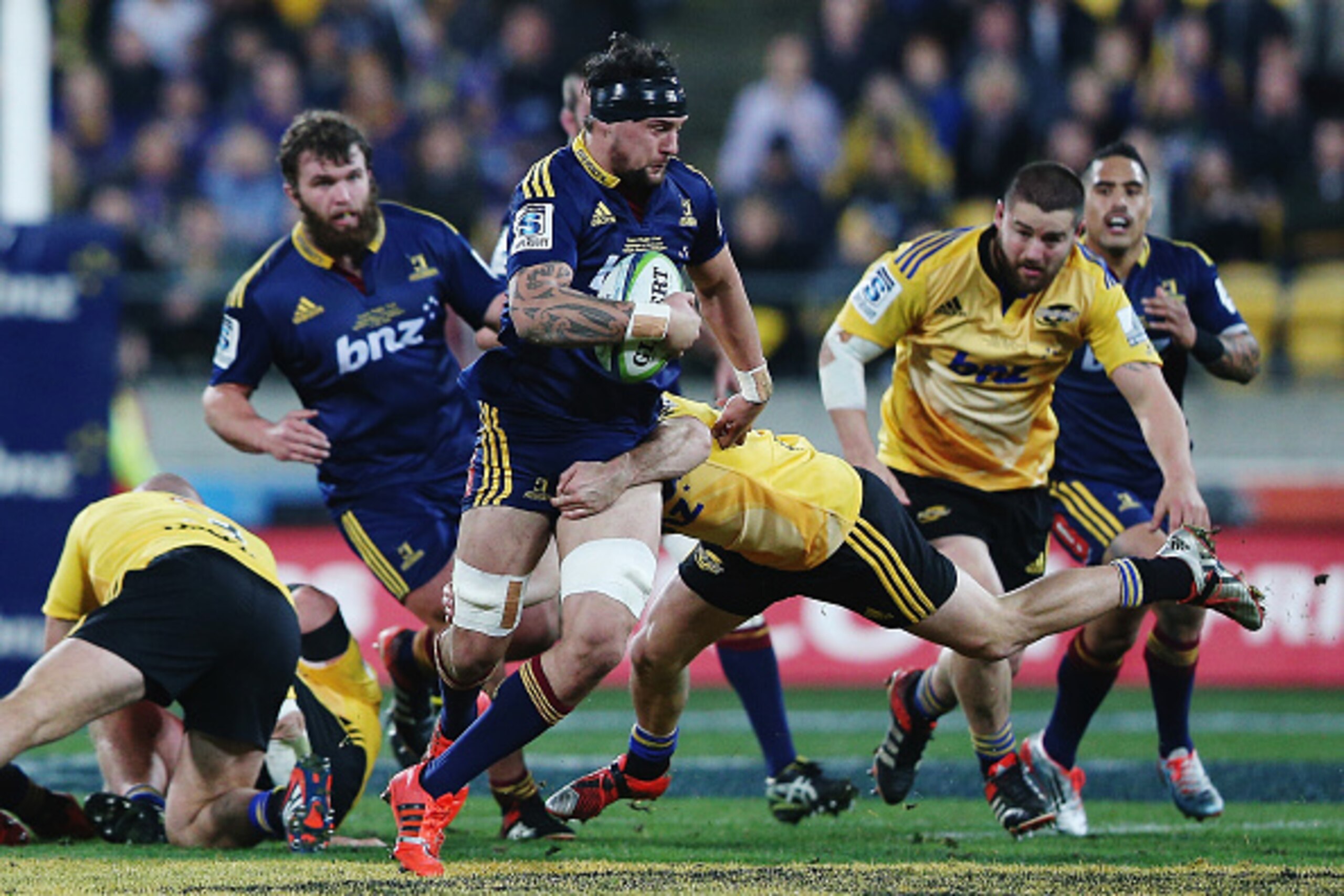 WELLINGTON, NEW ZEALAND - JULY 04: Elliot Dixon of the Highlanders charges forward during the Super Rugby Final match between the Hurricanes and the Highlanders at Westpac Stadium on July 4, 2015 in Wellington, New Zealand.  (Photo by Hannah Peters/Getty 