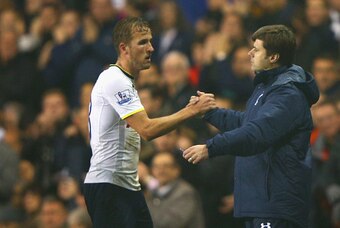 LONDON, ENGLAND - OCTOBER 29:  Harry Kane of Spurs shakes hands with Manager Mauricio Pochettino of Spurs during the Capital One Cup Fourth Round match Tottenham Hotspur and Brighton & Hove Albion at White Hart Lane on October 29, 2014 in London, England.