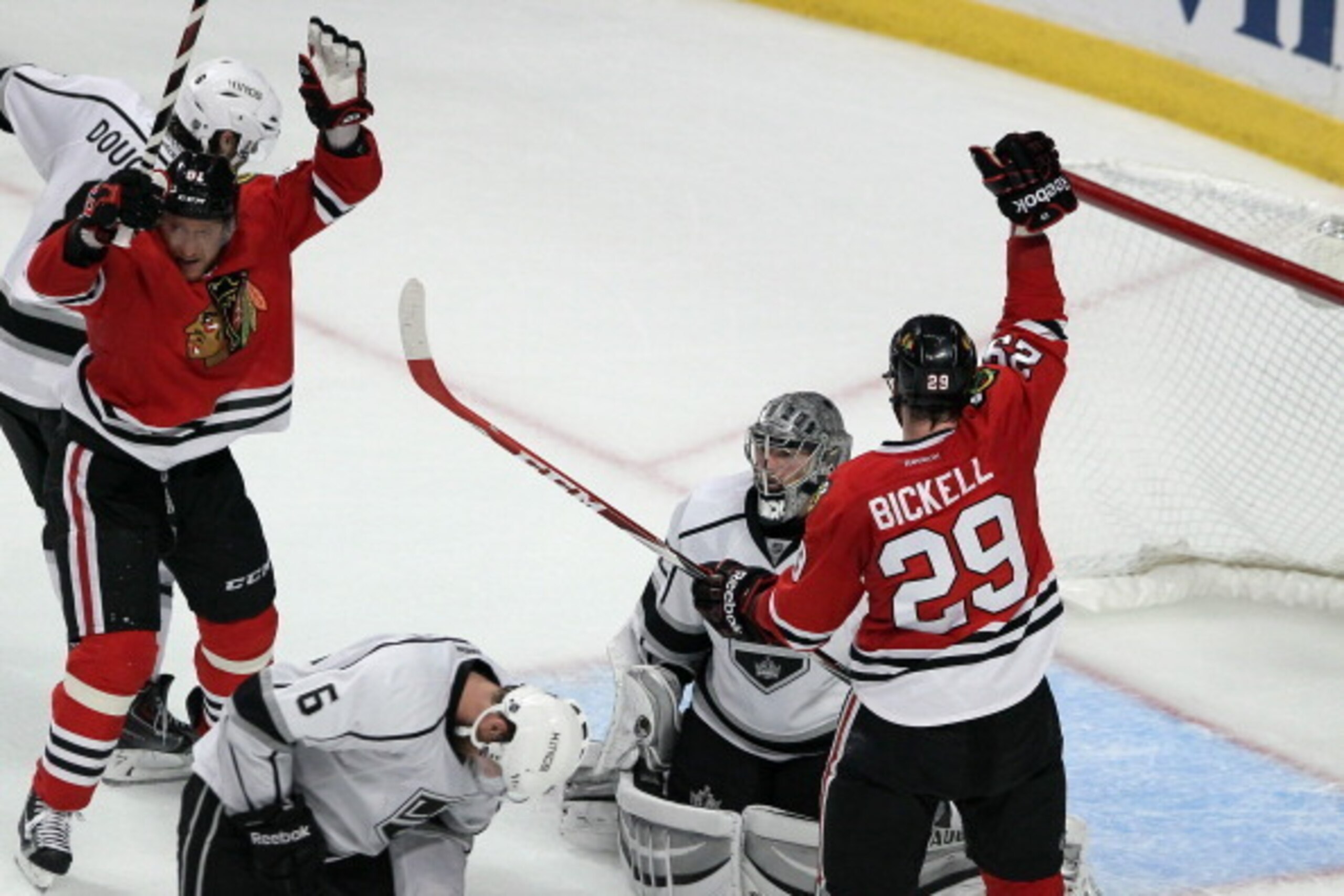 CHICAGO, IL - JUNE 01:  Marian Hossa #81 and Bryan Bickell #29 celebrate teammate Patrick Sharp #10 of the Chicago Blackhawks goal against Jonathan Quick #32 of the Los Angeles Kings in the second period during Game Seven of the Western Conference Final i