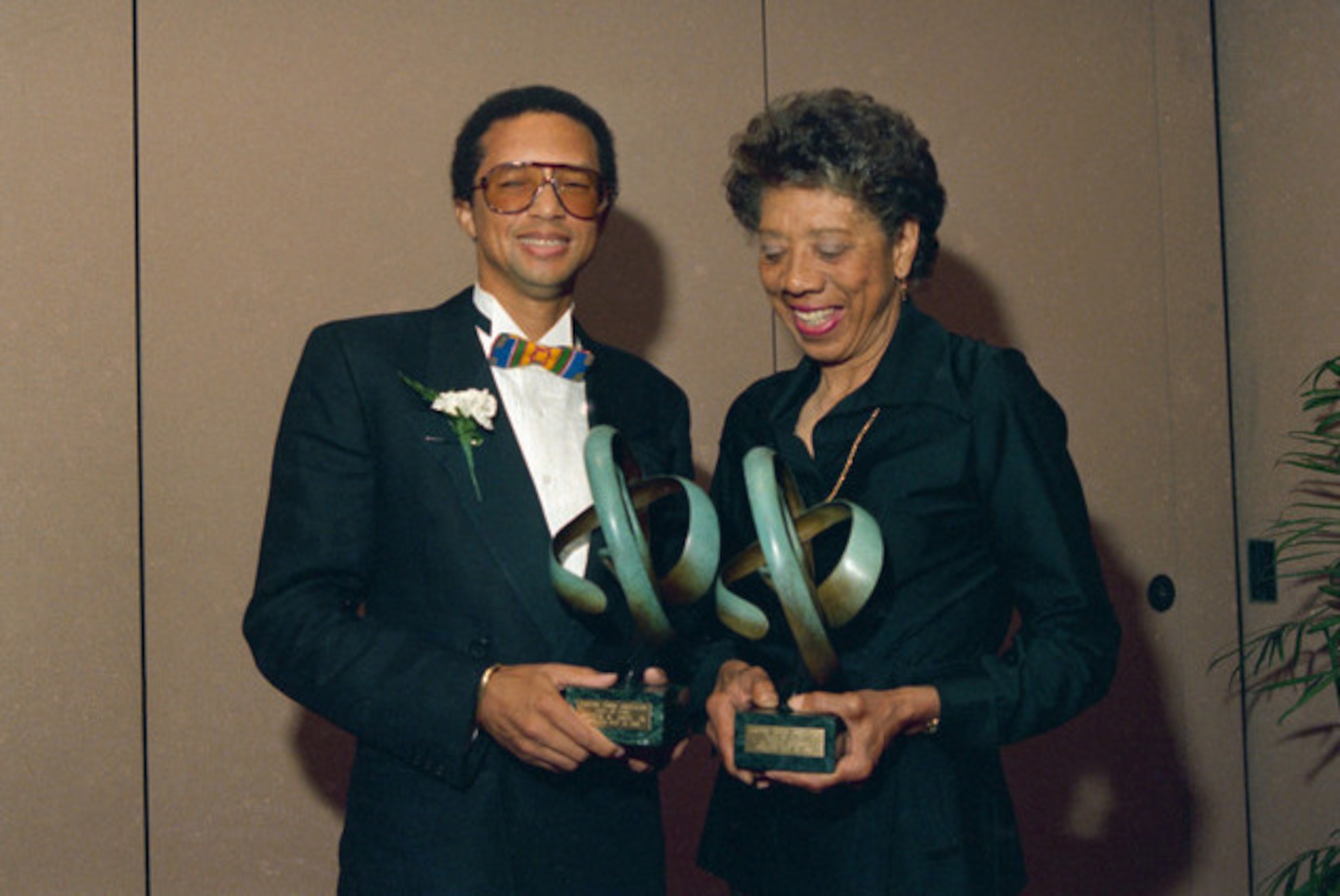 Arthur Ashe and Althea Gibson during the International Tennis Hall of Fame induction in 1988.