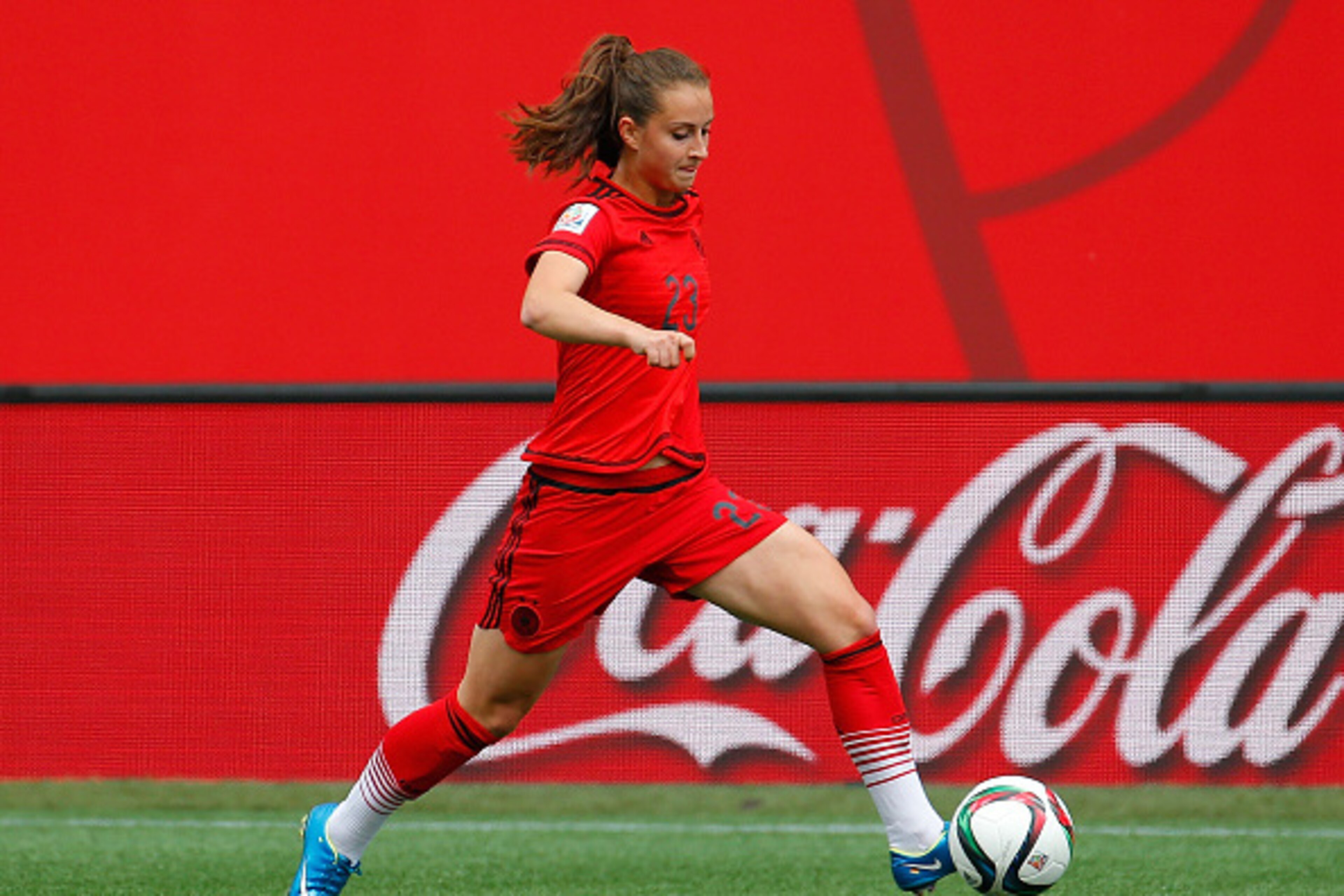 WINNIPEG, MB - JUNE 15:  Sara Daebritz #23 of Germany against Thailand during the FIFA Women's World Cup Canada 2015 match between Thailand and Germany at Winnipeg Stadium on June 15, 2015 in Winnipeg, Canada.  (Photo by Kevin C. Cox/Getty Images)