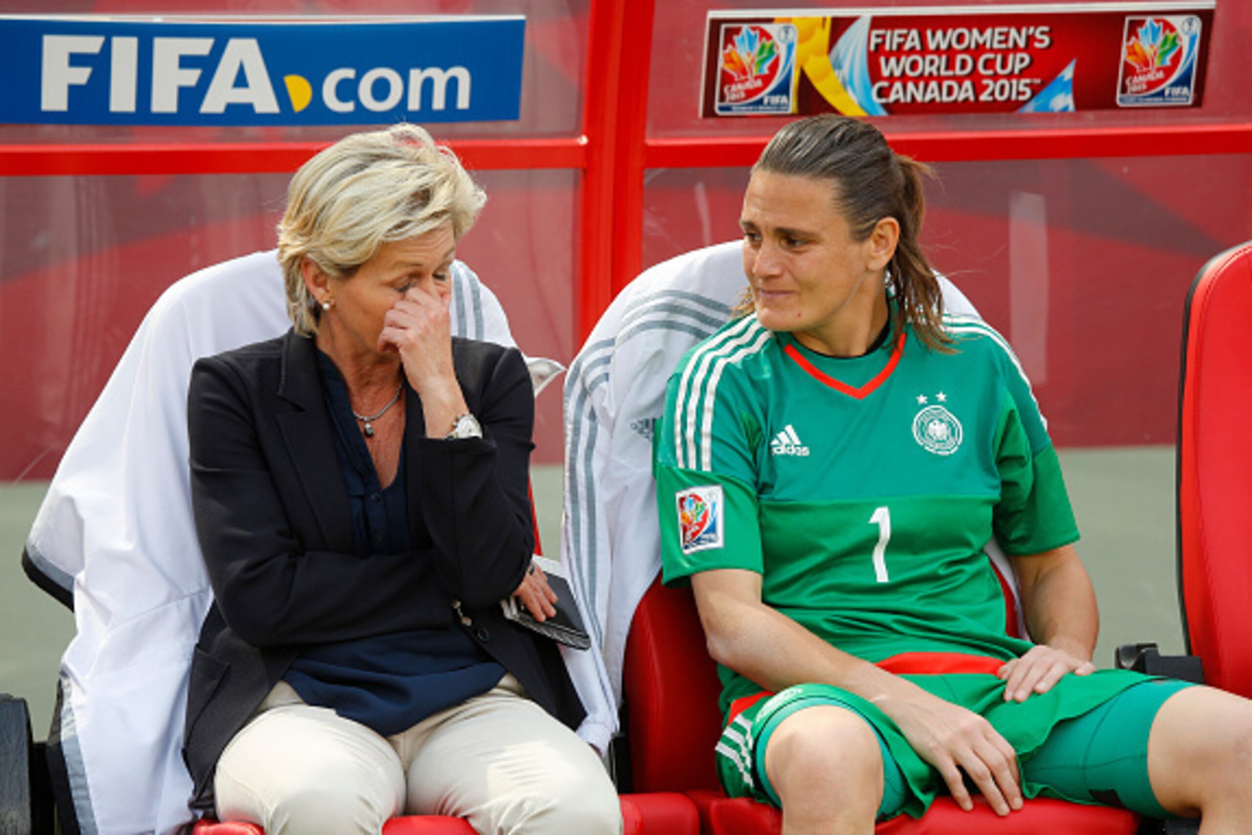 EDMONTON, AB - JULY 4: Head coach Silvia Neid and goalkeeper Nadine Angerer #1 of Germany react to their loss against England during the FIFA Women's World Cup Canada 3rd Place Play-off match between England and Germany at Commonwealth Stadium on July 4, 