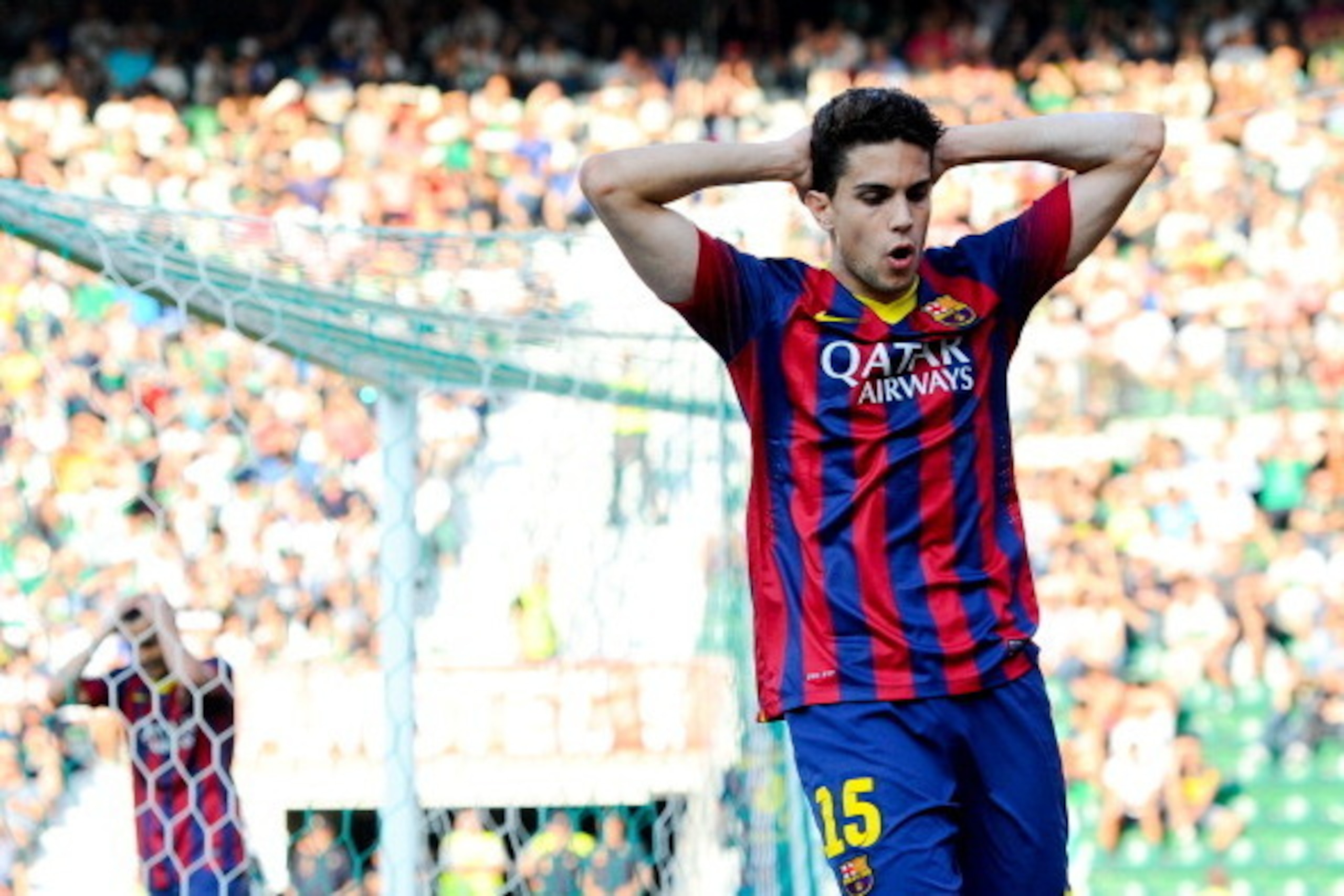ELCHE, SPAIN - MAY 11:  Marc Bartra of FC Barcelona reacts during the La Liga match between Elche FC and FC Barcelona at Estadio Manuel Martinez Valero on May 11, 2014 in Elche, Spain.  (Photo by David Ramos/Getty Images)