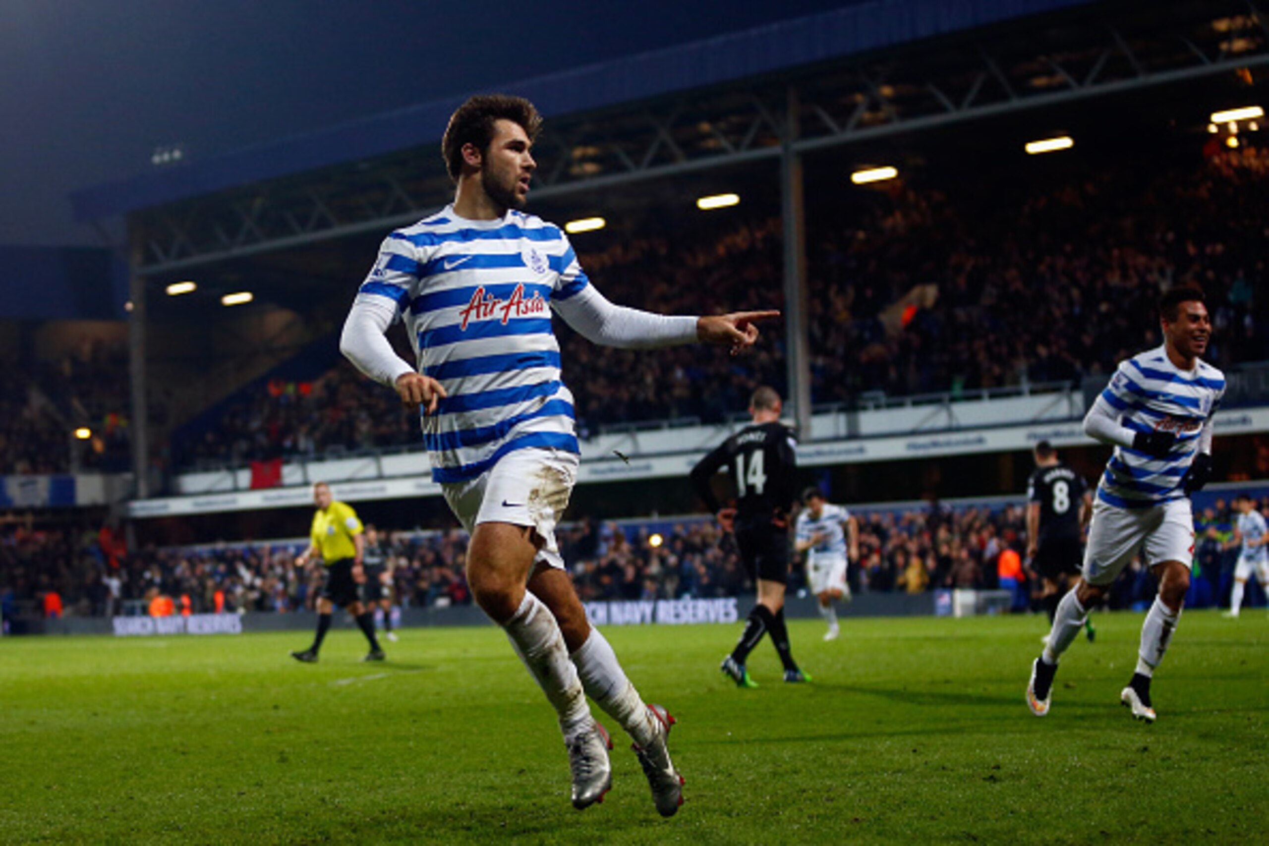 LONDON, ENGLAND - DECEMBER 06: Charlie Austin of QPR celebrates scoring his team's second goal during the Barclays Premier League match between Queens Park Rangers and Burnley at Loftus Road on December 6, 2014 in London, England. (Photo by Julian Finn LONDON, ENGLAND - DECEMBER 06: Charlie Austin of QPR celebrates scoring his team's second goal during the Barclays Premier League match between Queens Park Rangers and Burnley at Loftus Road on December 6, 2014 in London, England. (Photo by Julian Finn