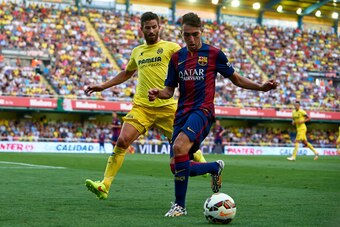 VILLARREAL, SPAIN - AUGUST 31:  Munir (R) of Barcelona is closed down by Mateo Pablo Musacchio of Villarreal during the La Liga match between Villarreal CF and FC Barcelona at El Madrigal stadium on August 31, 2014 in Villarreal, Spain.  (Photo by Manuel 