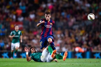 BARCELONA, SPAIN - AUGUST 18: Munir competes for the ball with Jose Juan Vazquez of Club Leon during the Joan Gamper Trophy match between FC Barcelona and Club Leon at Camp Nou on August 18, 2014 in Barcelona, Spain.  (Photo by David Ramos/Getty Images)