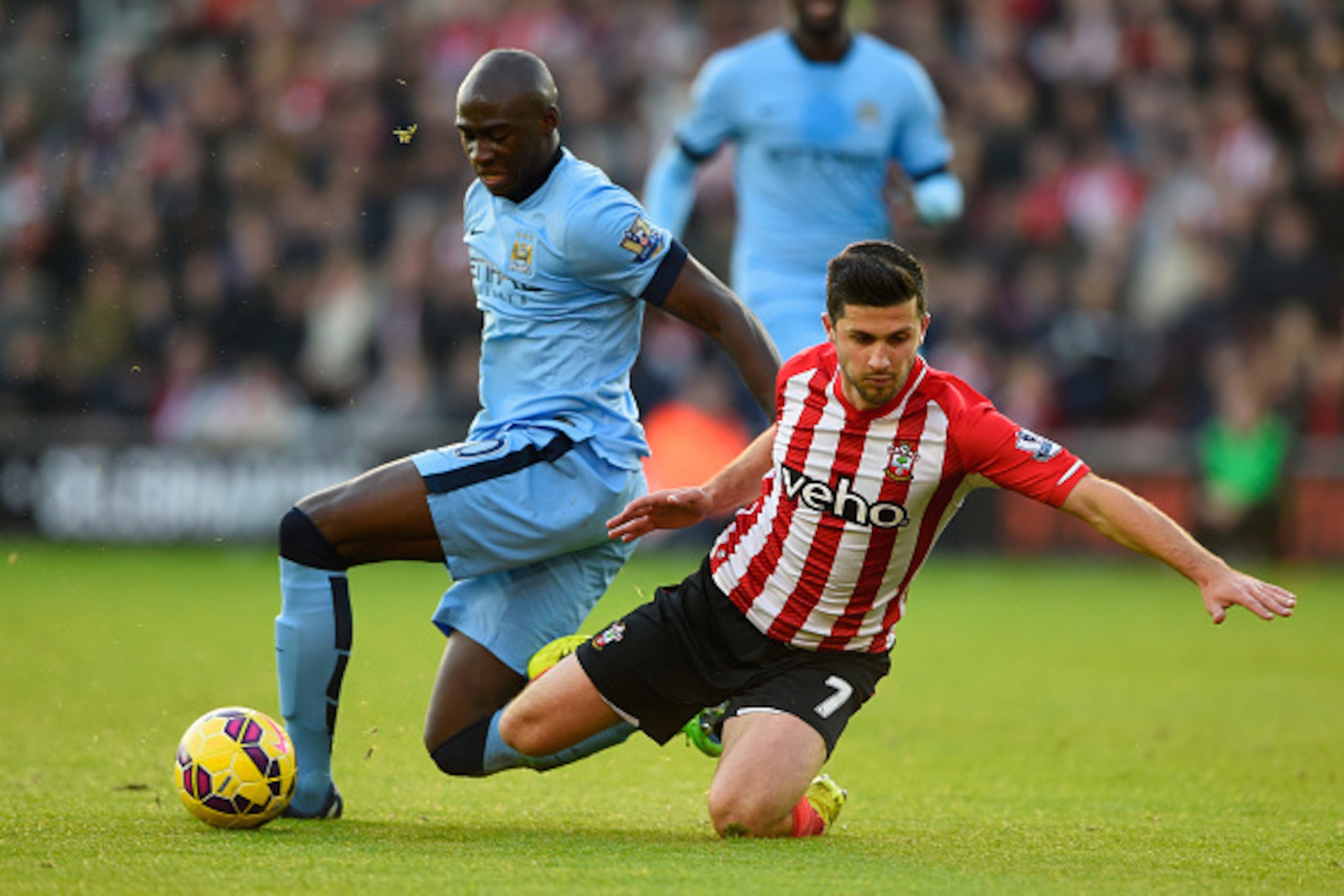 SOUTHAMPTON, ENGLAND - NOVEMBER 30: Eliaquim Mangala of Manchester City challenges Shane Long of Southampton during the Barclays Premier League match between Southampton and Manchester City at St Mary's Stadium on November 30, 2014 in Southampton, Englan SOUTHAMPTON, ENGLAND - NOVEMBER 30: Eliaquim Mangala of Manchester City challenges Shane Long of Southampton during the Barclays Premier League match between Southampton and Manchester City at St Mary's Stadium on November 30, 2014 in Southampton, Englan