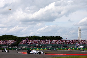 NORTHAMPTON, ENGLAND - JULY 05:  Felipe Massa of Brazil and Williams leads Valtteri Bottas of Finland and Williams, Lewis Hamilton of Great Britain and Mercedes GP and Nico Rosberg of Germany and Mercedes GP after resumption of the Formula One Grand Prix 