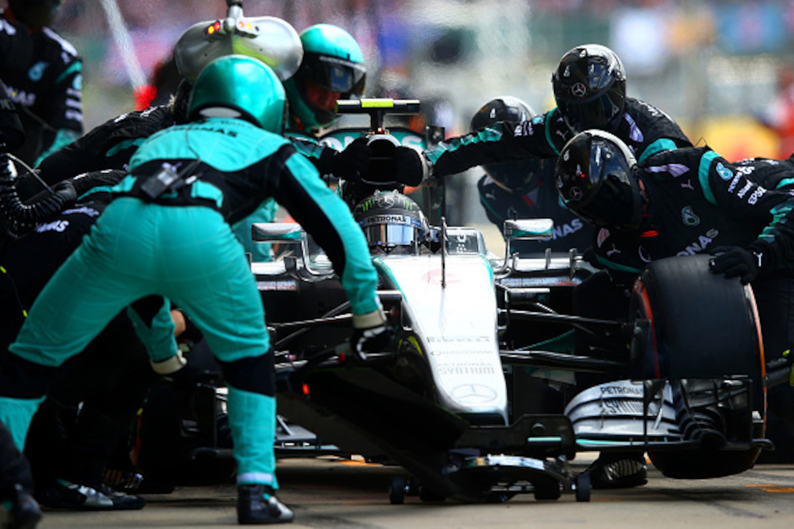NORTHAMPTON, ENGLAND - JULY 05: Nico Rosberg of Germany and Mercedes GP makes a pit stop during the Formula One Grand Prix of Great Britain at Silverstone Circuit on July 5, 2015 in Northampton, England. (Photo by Mark Thompson/Getty Images) NORTHAMPTON, ENGLAND - JULY 05: Nico Rosberg of Germany and Mercedes GP makes a pit stop during the Formula One Grand Prix of Great Britain at Silverstone Circuit on July 5, 2015 in Northampton, England. (Photo by Mark Thompson/Getty Images)