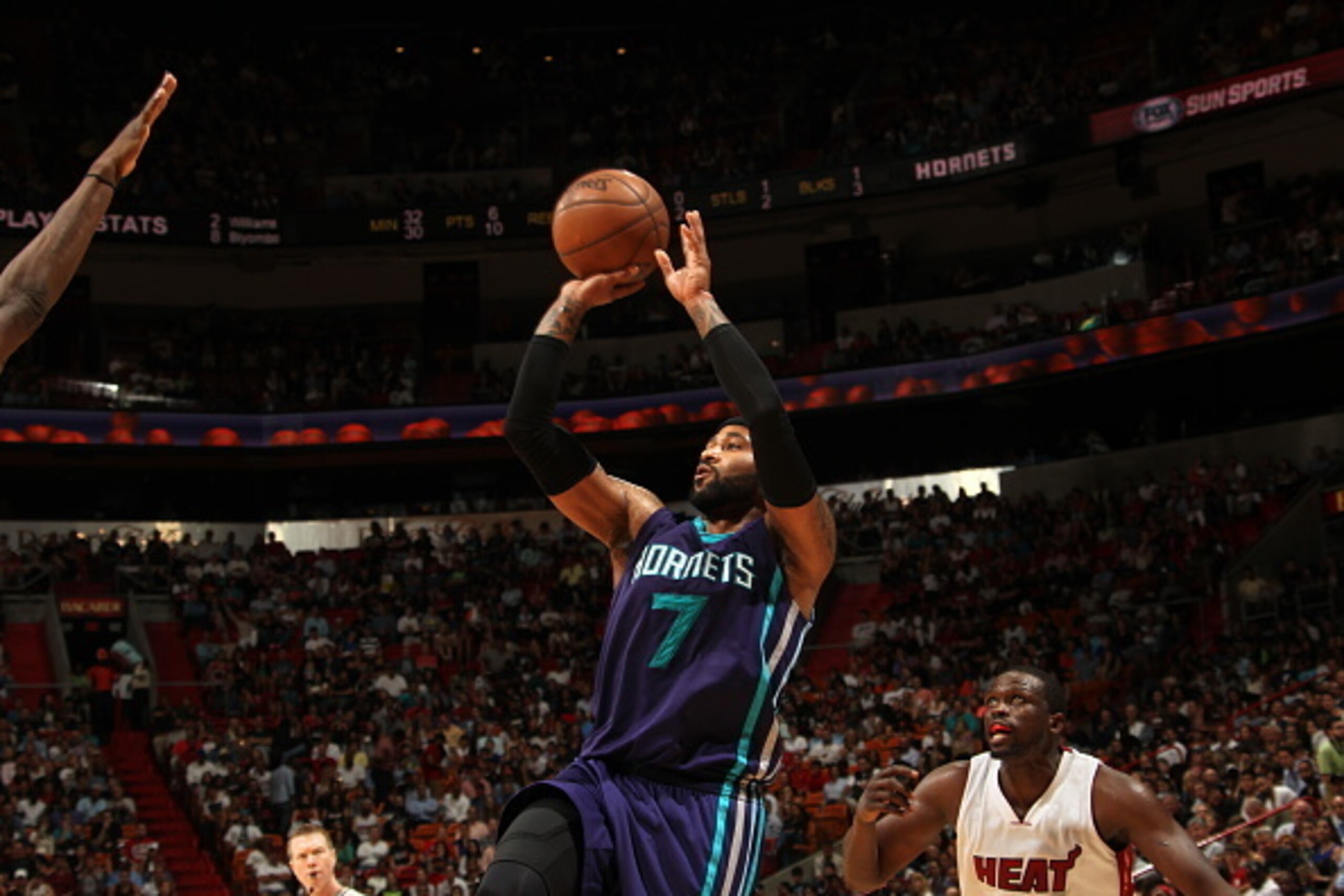 MIAMI, FL - APRIL 7:  Mo Williams #7 of the Charlotte Hornets shoots against the Miami Heat on April 7, 2015 at American Airlines Arena in Miami, Florida.  NOTE TO USER: User expressly acknowledges and agrees that, by downloading and or using this Photogr
