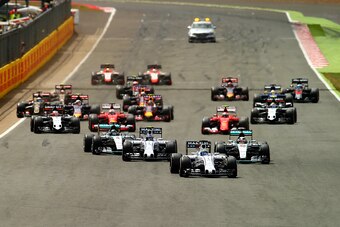 NORTHAMPTON, ENGLAND - JULY 05:  Felipe Massa of Brazil and Williams leads Lewis Hamilton of Great Britain and Mercedes GP, Valtteri Bottas of Finland and Williams and Nico Rosberg of Germany and Mercedes GP during the Formula One Grand Prix of Great Brit