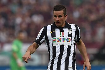 TURIN, ITALY - APRIL 26:  Simone Padoin of Juventus FC in action during the Serie A match between Torino FC and Juventus FC at Stadio Olimpico di Torino on April 26, 2015 in Turin, Italy.  (Photo by Valerio Pennicino/Getty Images)