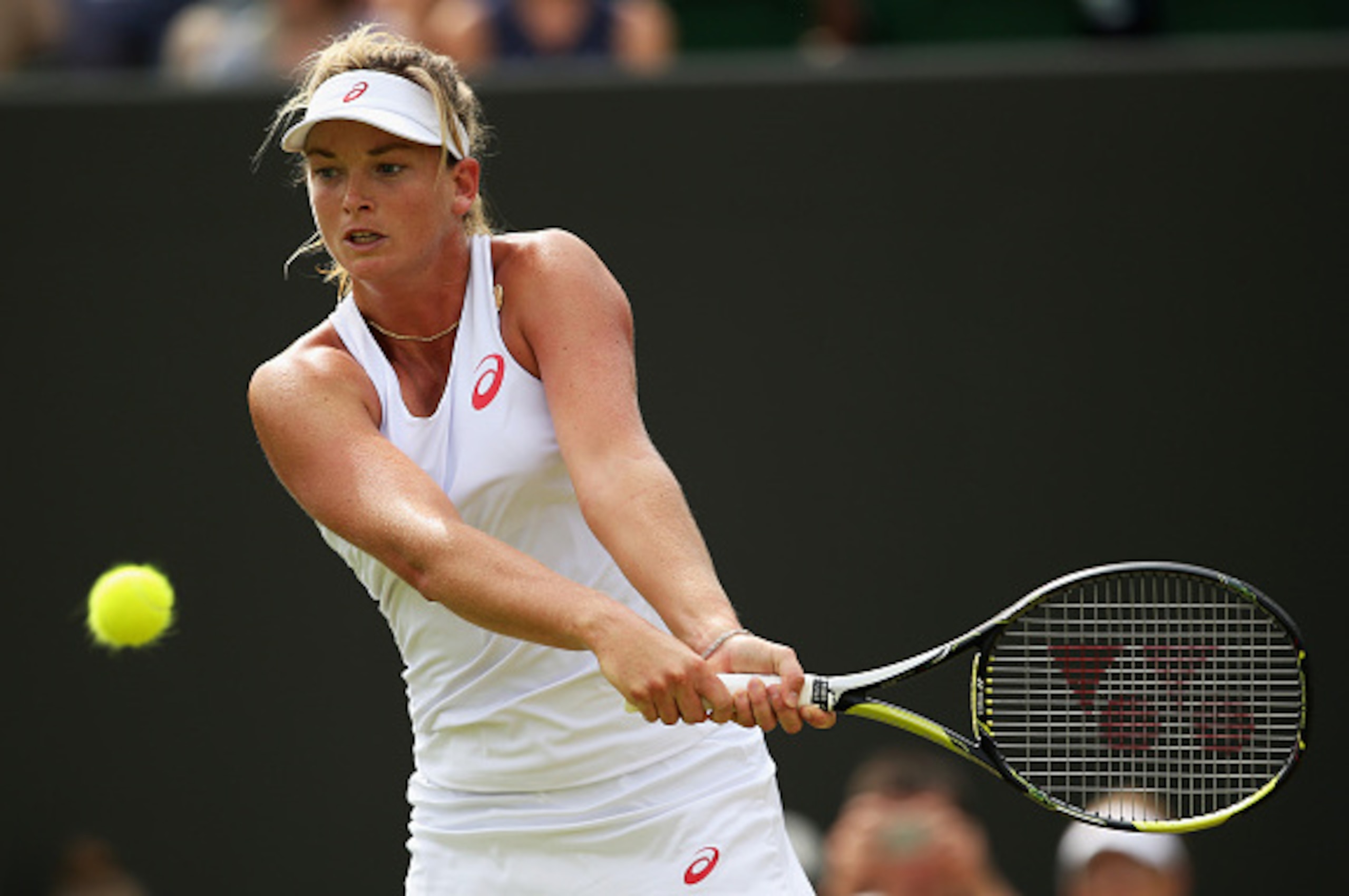 LONDON, ENGLAND - JULY 03:  Coco Vandeweghe of the United States plays a backhand in her LadiesÂ Singles Third Round match against Samantha Stosur of Australia during day five of the Wimbledon Lawn Tennis Championships at the All England Lawn Tennis and C