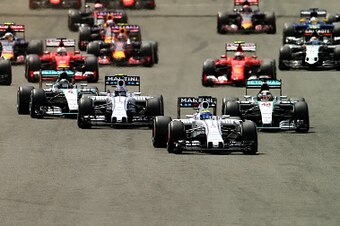 NORTHAMPTON, ENGLAND - JULY 05:  Felipe Massa of Brazil and Williams leads Lewis Hamilton of Great Britain and Mercedes GP, Valtteri Bottas of Finland and Williams and Nico Rosberg of Germany and Mercedes GP during the Formula One Grand Prix of Great Brit