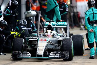 NORTHAMPTON, ENGLAND - JULY 05:  Lewis Hamilton of Great Britain and Mercedes GP makes a pit stop during the Formula One Grand Prix of Great Britain at Silverstone Circuit on July 5, 2015 in Northampton, England.  (Photo by Mark Thompson/Getty Images)