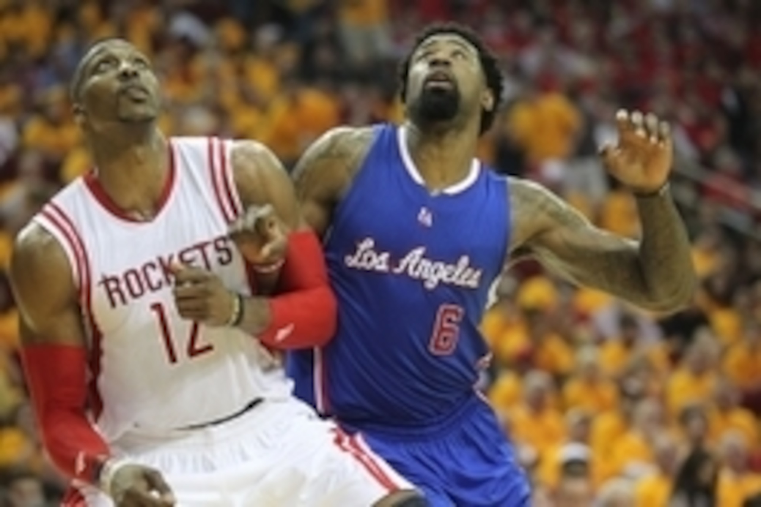 May 12, 2015; Houston, TX, USA; Houston Rockets center Dwight Howard (12) tries to box Los Angeles Clippers center DeAndre Jordan (6) out of the paint in game five of the second round of the NBA Playoffs at Toyota Center. Rockets won 124 to 103. Mandatory