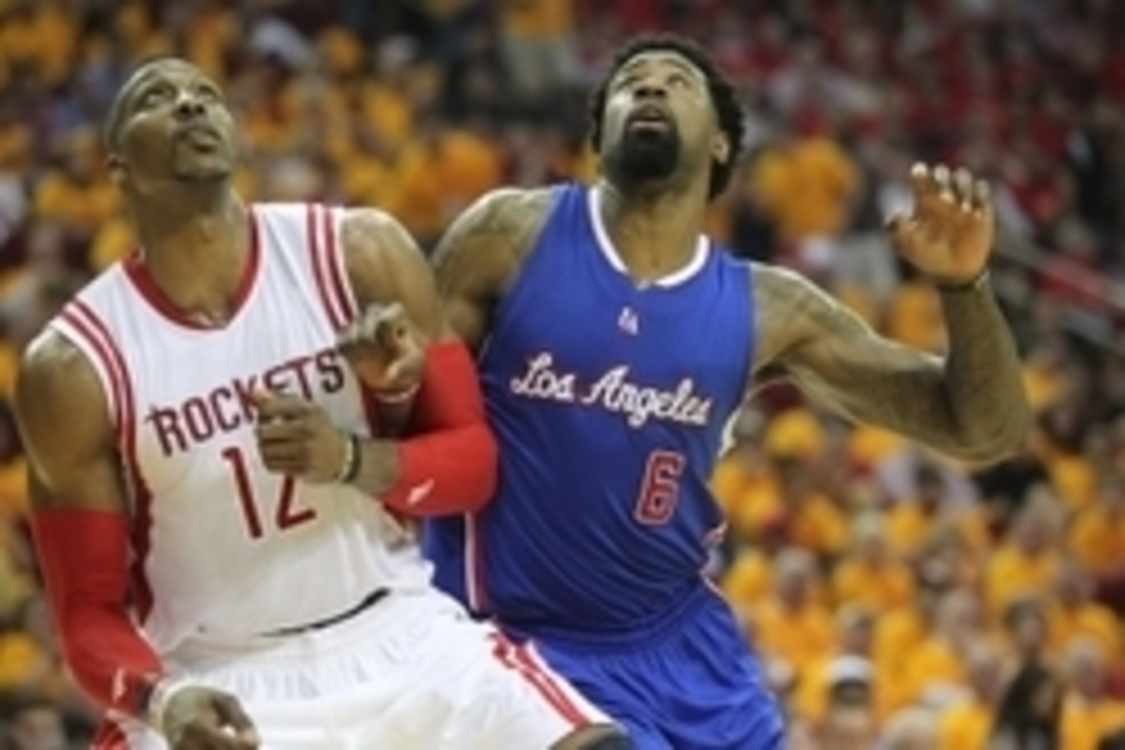 May 12, 2015; Houston, TX, USA; Houston Rockets center Dwight Howard (12) tries to box Los Angeles Clippers center DeAndre Jordan (6) out of the paint in game five of the second round of the NBA Playoffs at Toyota Center. Rockets won 124 to 103. Mandatory